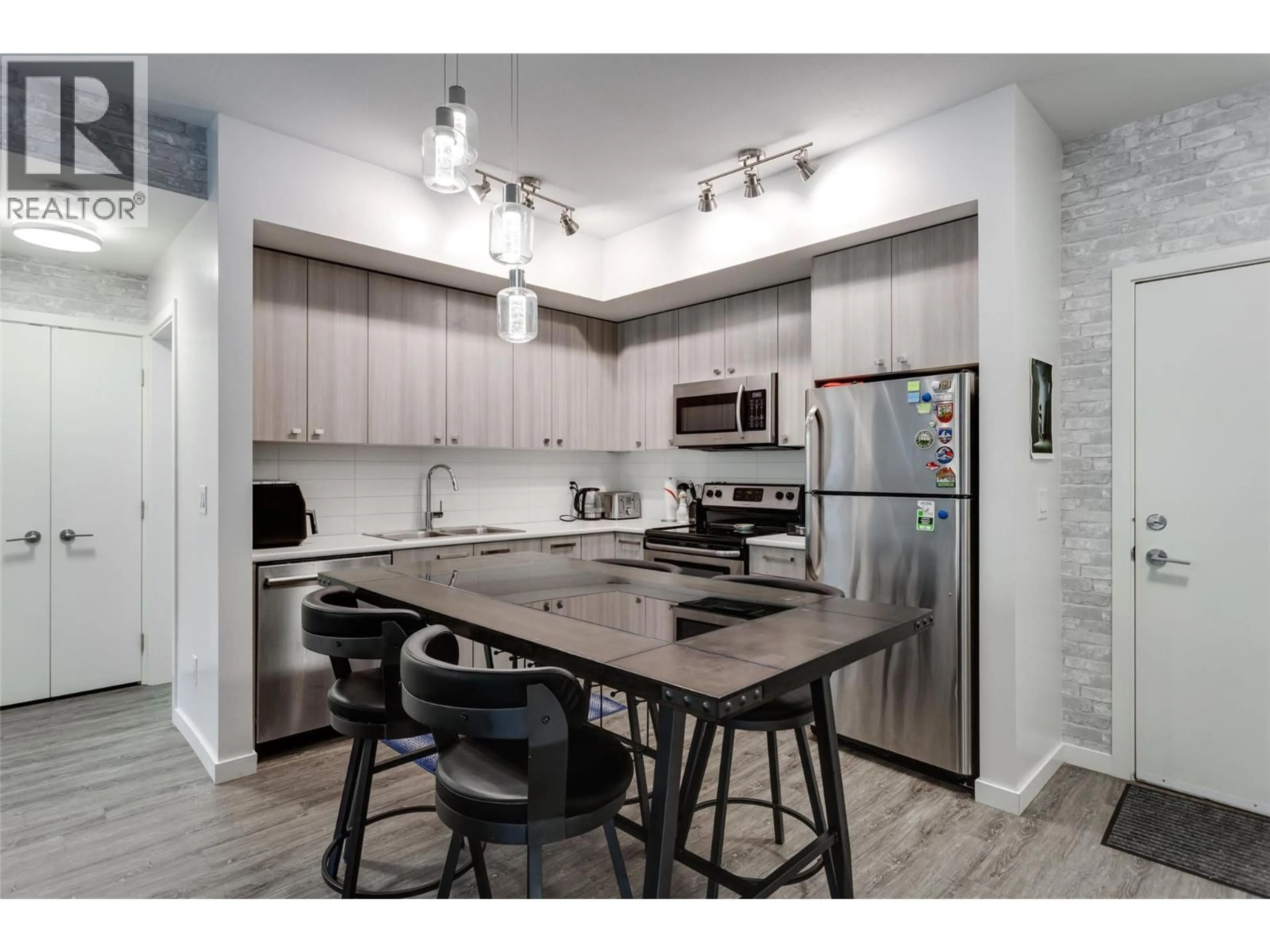 Open concept kitchen, unknown for 118 - 935 ACADEMY WAY, Kelowna British Columbia V1V3A9