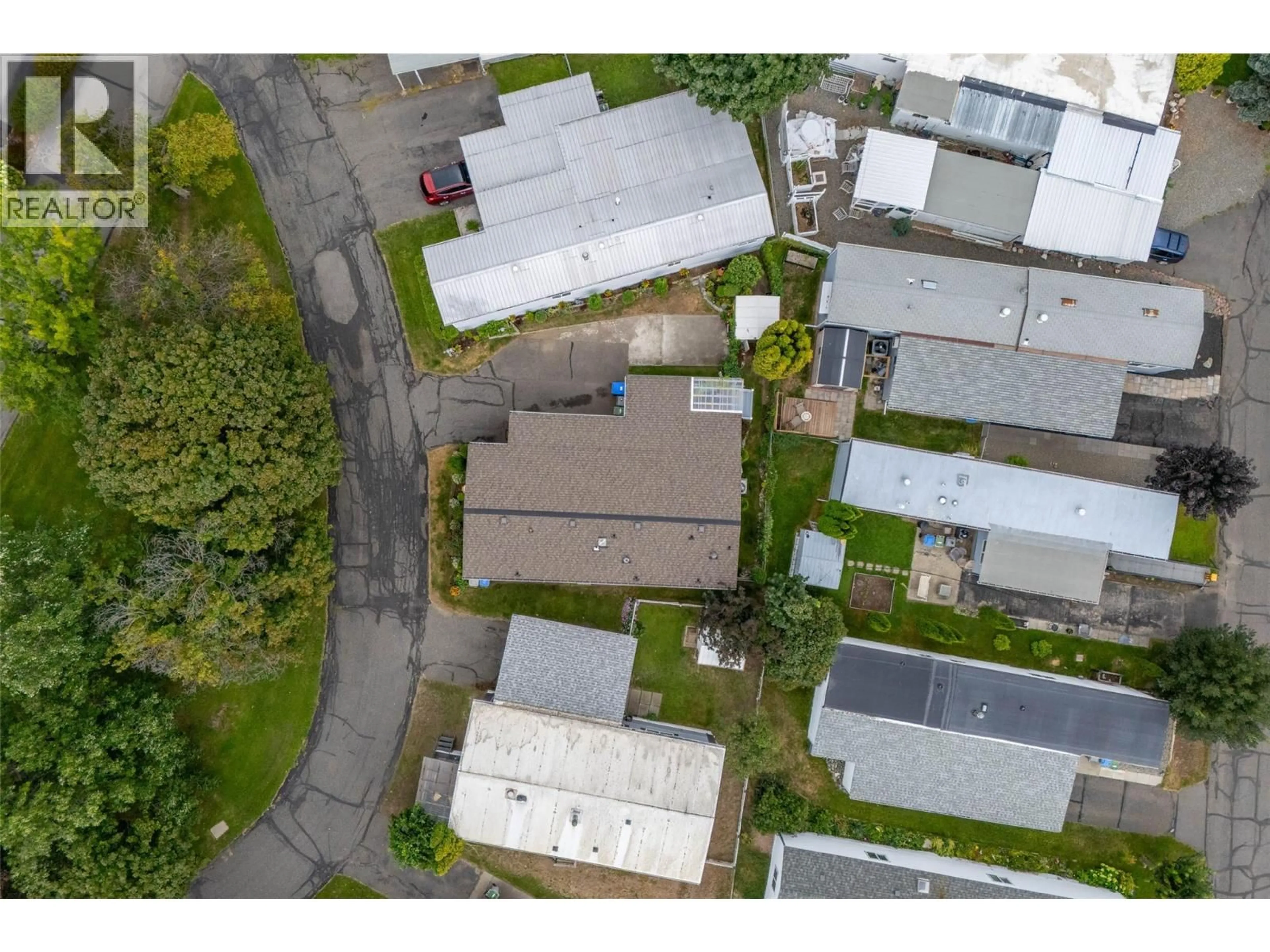 A pic from outside/outdoor area/front of a property/back of a property/a pic from drone, street for 236 - 2400 OAKDALE WAY, Kamloops British Columbia V2B6W7
