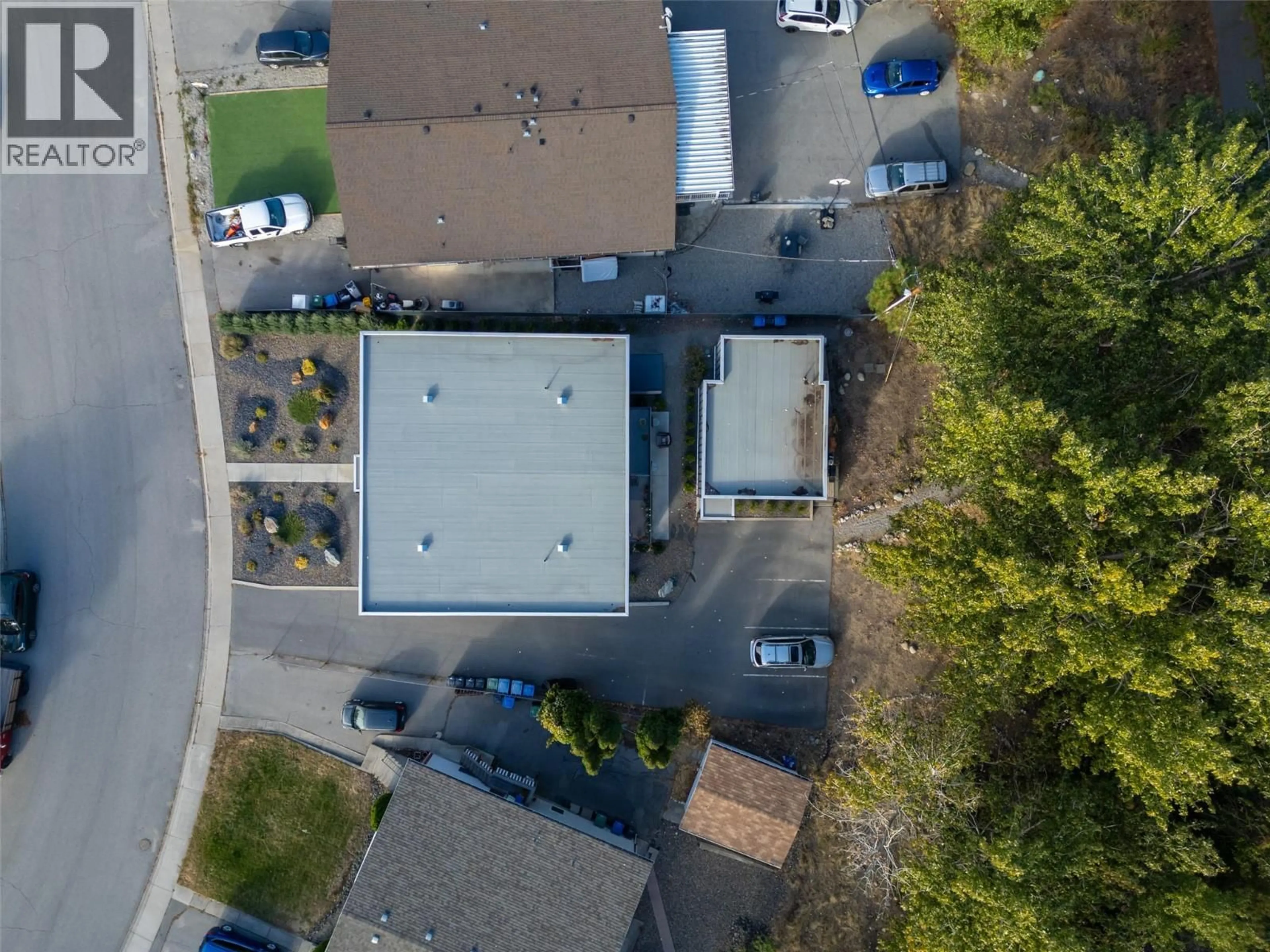 A pic from outside/outdoor area/front of a property/back of a property/a pic from drone, street for 166 MCPHERSON CRESCENT, Penticton British Columbia V2A2N8