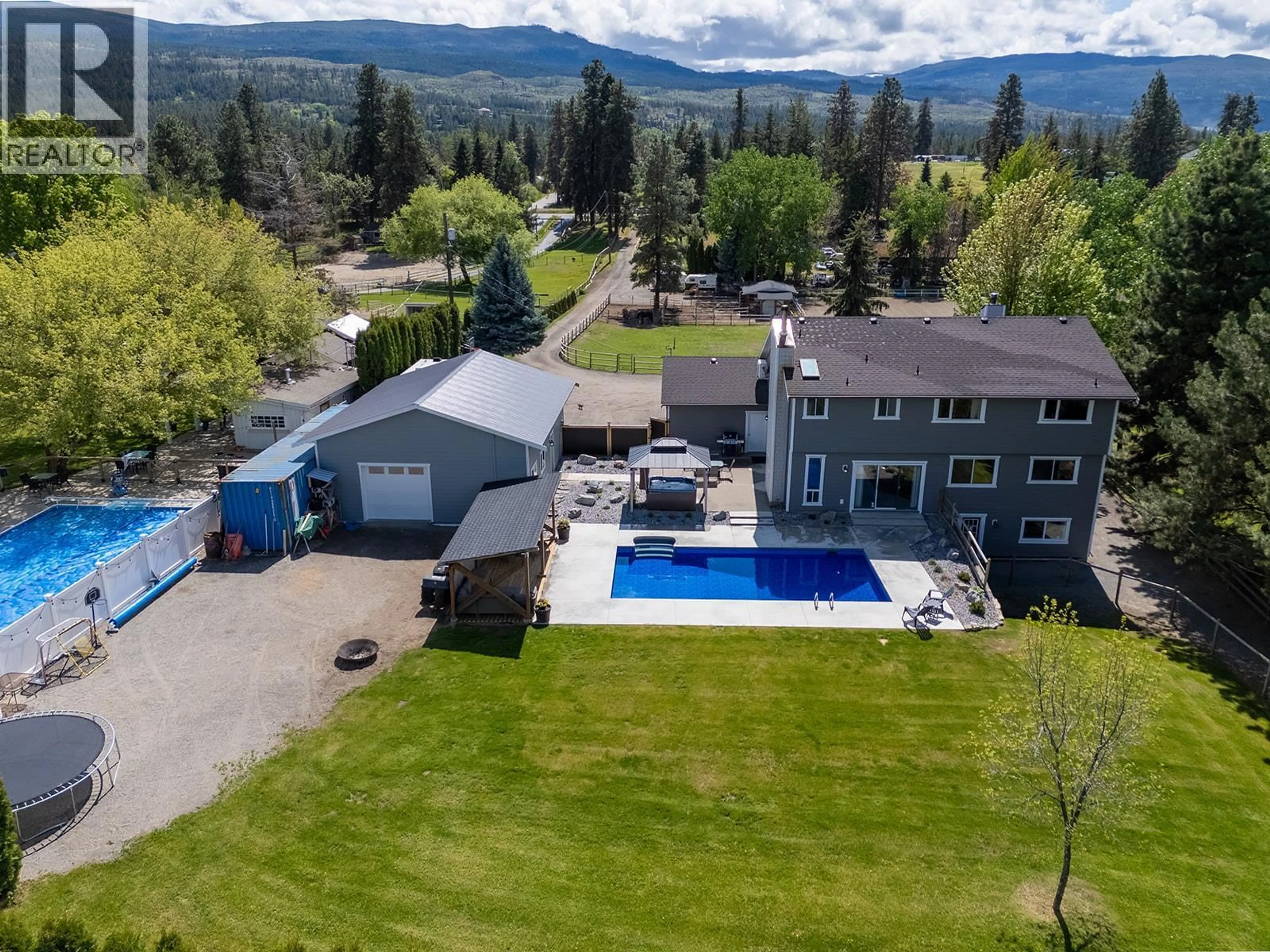 A pic from outside/outdoor area/front of a property/back of a property/a pic from drone, mountain view for 4139 WALLACE HILL ROAD, Kelowna British Columbia V1W4B6