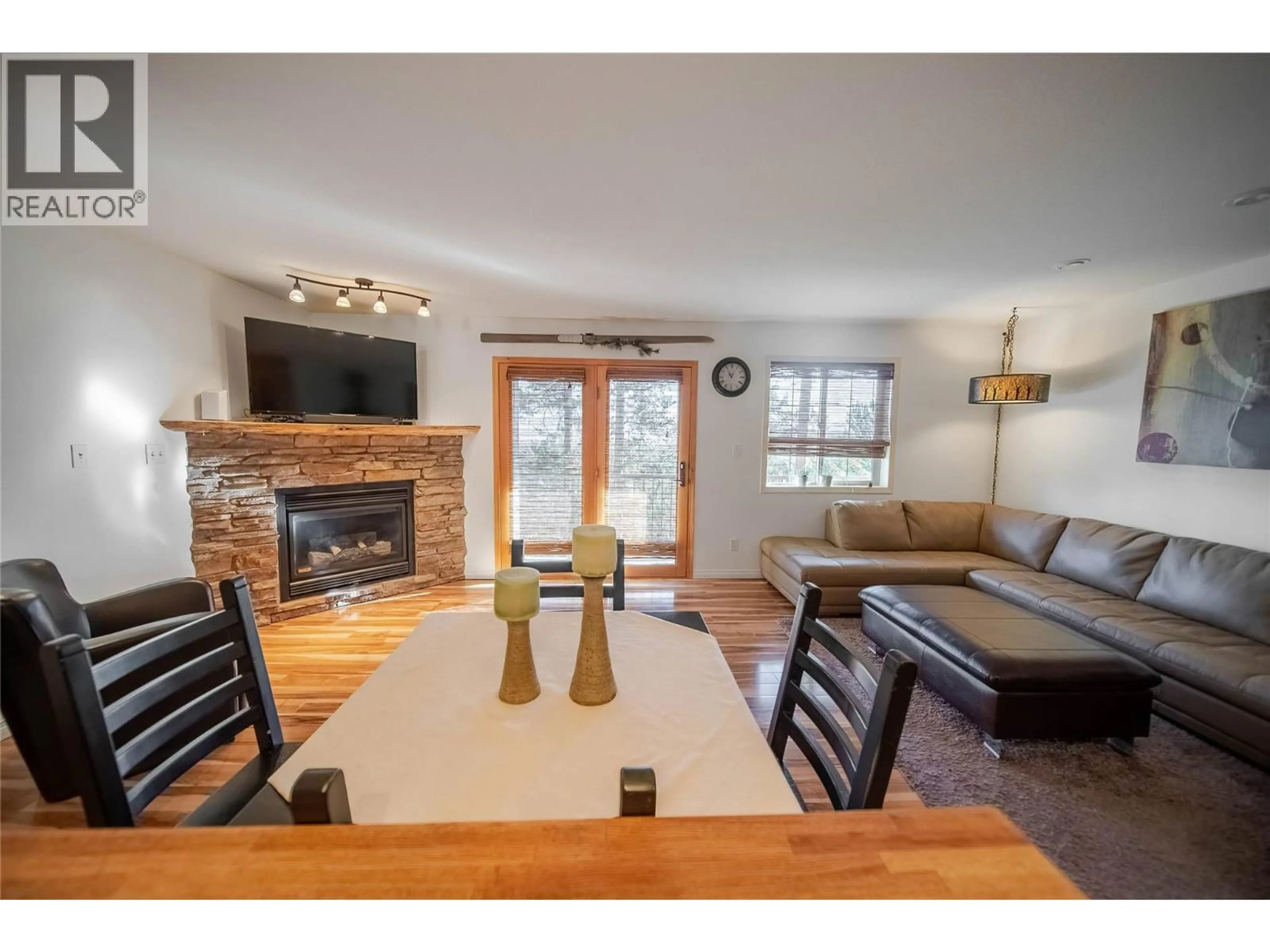 Living room with furniture, wood/laminate floor for 303 - 910 DOGWOOD DRIVE, Kimberley British Columbia V1A2Y5