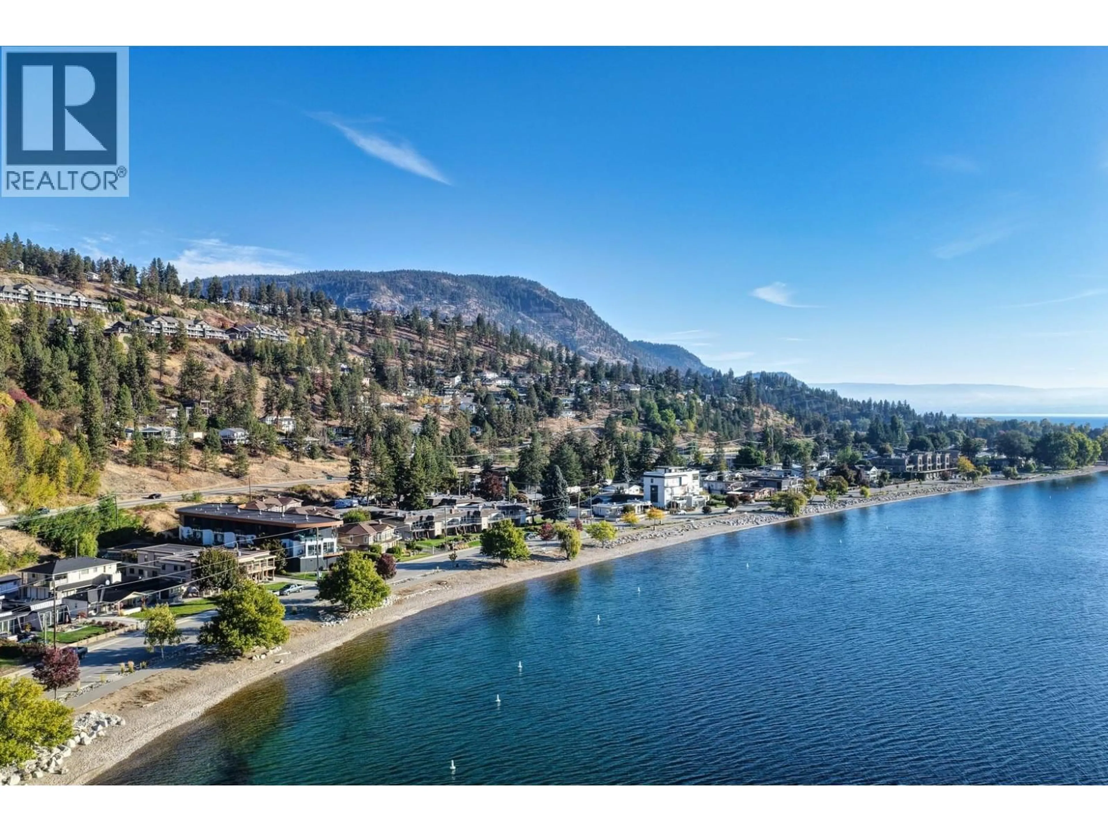 A pic from outside/outdoor area/front of a property/back of a property/a pic from drone, water/lake/river/ocean view for 1 - 4364 BEACH AVENUE, Peachland British Columbia V0H1X6