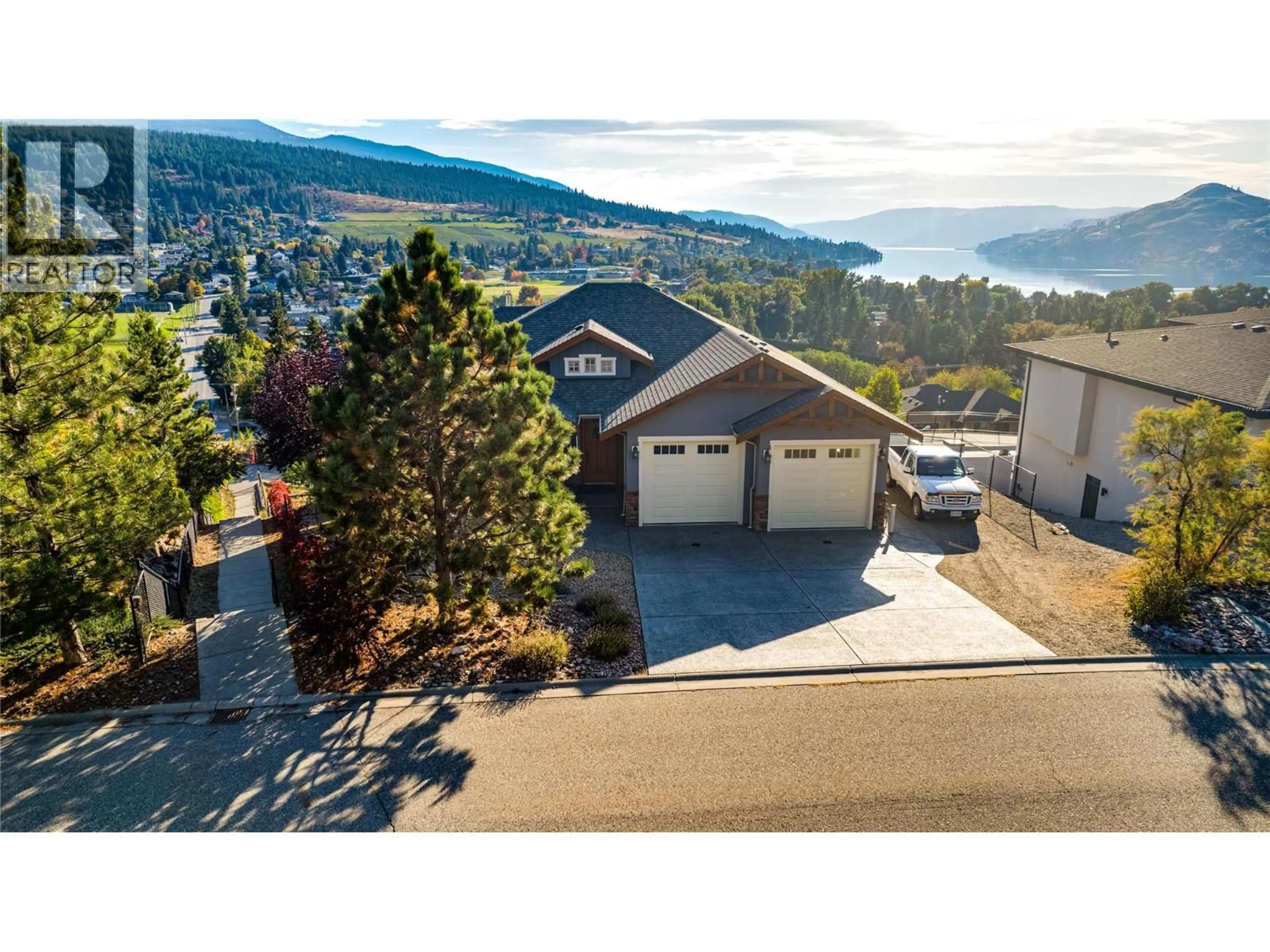 A pic from outside/outdoor area/front of a property/back of a property/a pic from drone, water/lake/river/ocean view for 8768 CORTLAND PLACE, Coldstream British Columbia V1B4B8