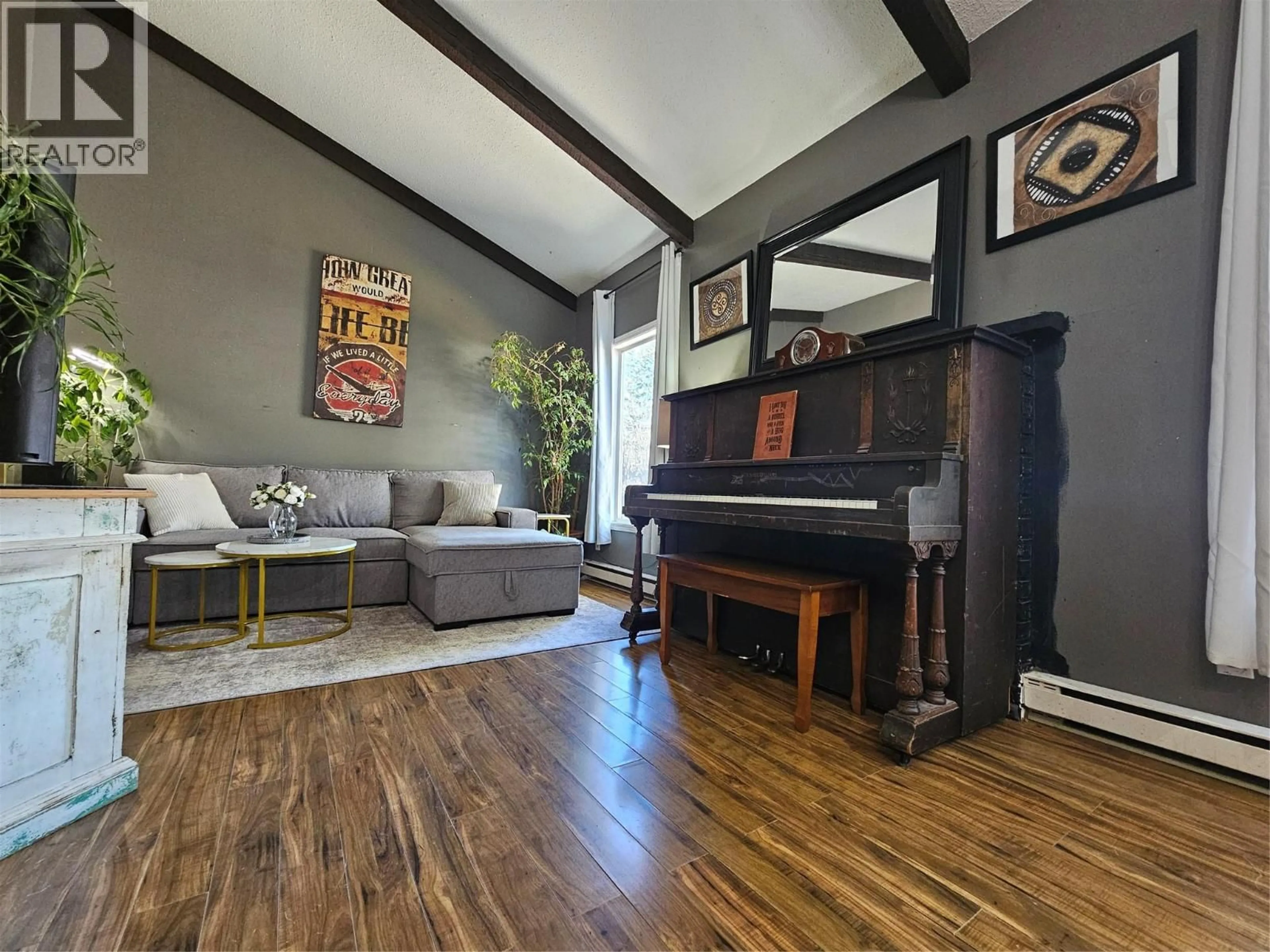 Living room with furniture, wood/laminate floor for 436 ORIOLE WAY, Barriere British Columbia V0E1E0