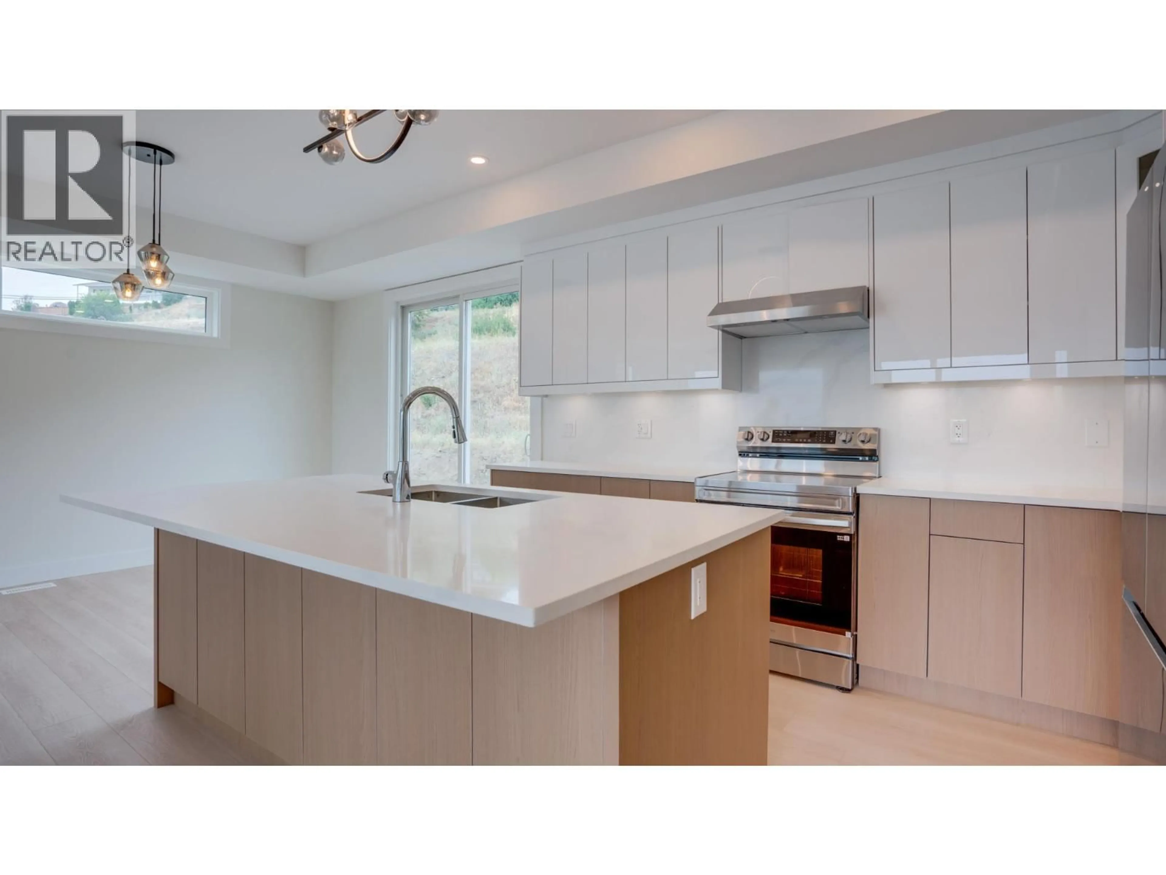 Open concept kitchen, ceramic/tile floor for 4 - 5705 HERITAGE DRIVE, Vernon British Columbia V1H1B1