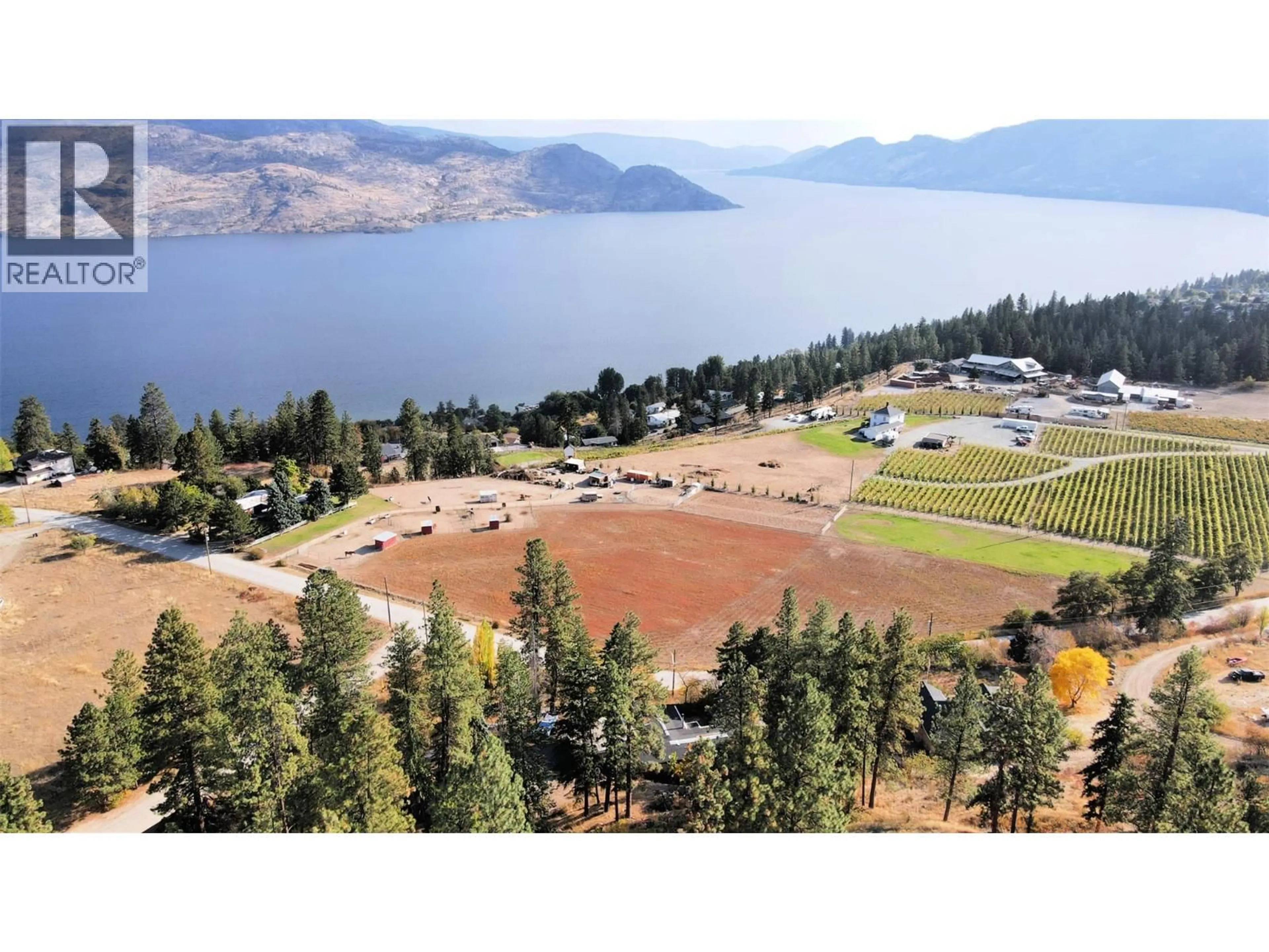 A pic from outside/outdoor area/front of a property/back of a property/a pic from drone, water/lake/river/ocean view for 5621 HARRINGTON COURT, Peachland British Columbia V0H1X4