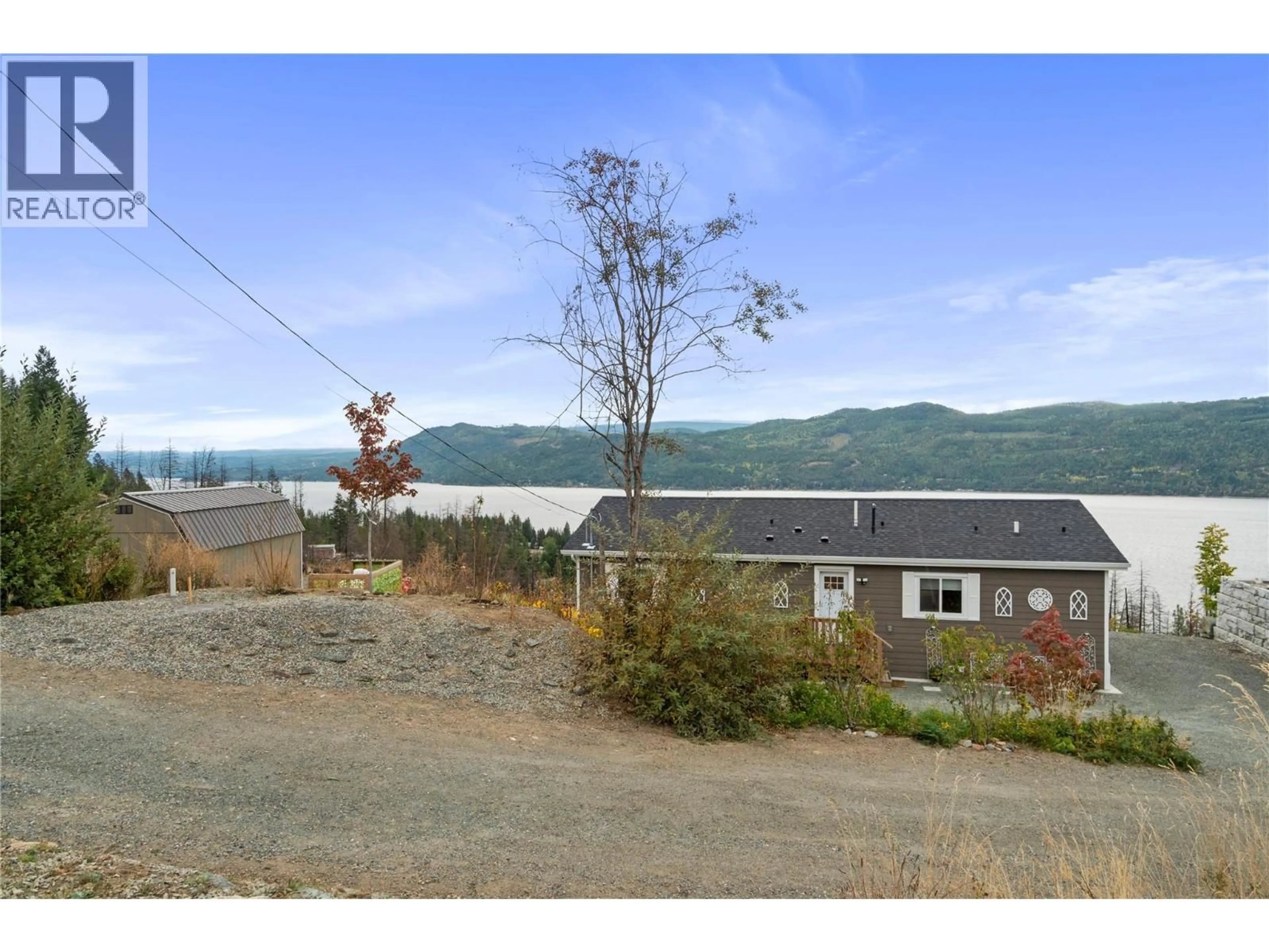A pic from outside/outdoor area/front of a property/back of a property/a pic from drone, water/lake/river/ocean view for 5208 CELISTA PLACE, Celista British Columbia V0E1M6