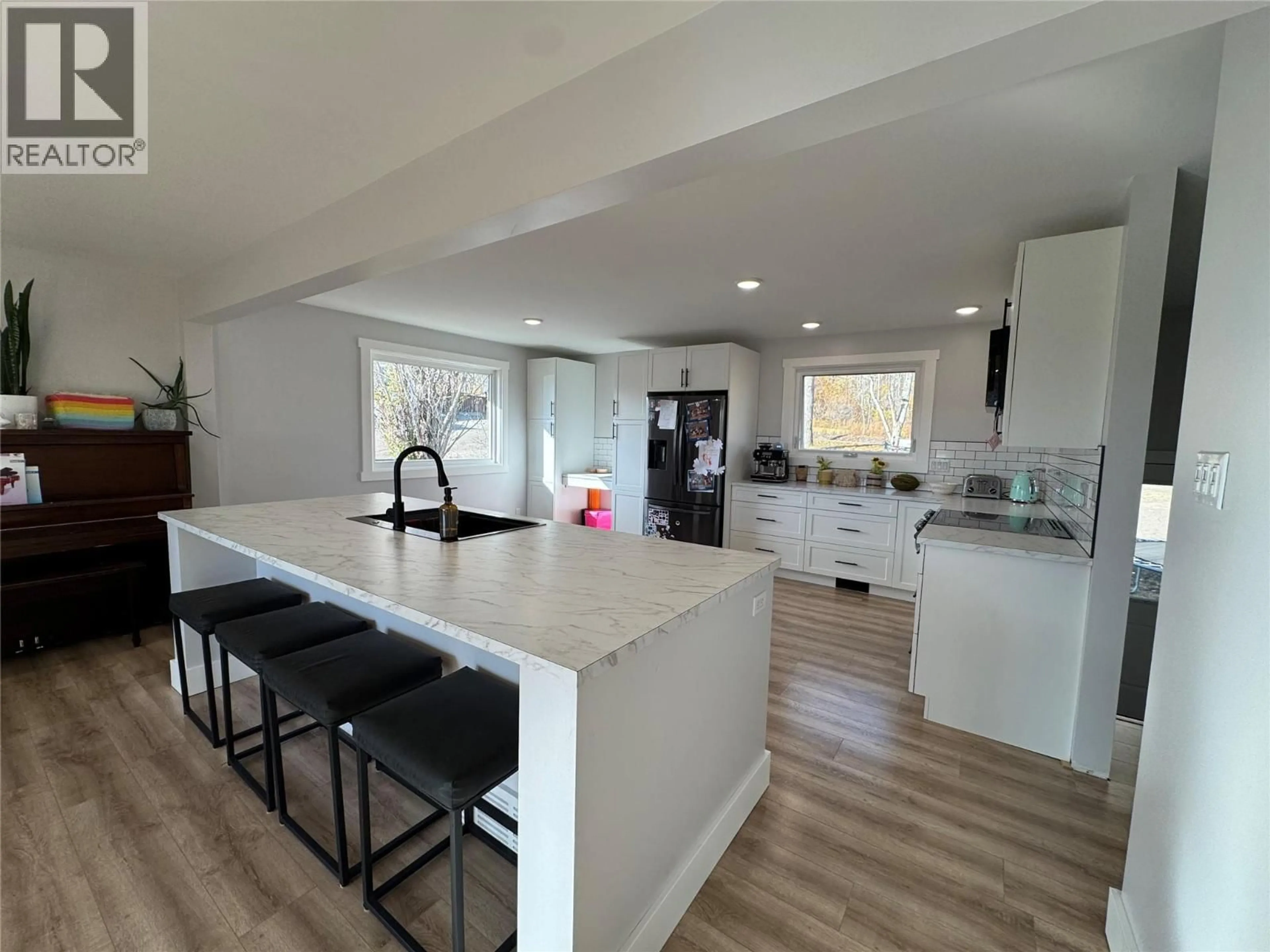 Open concept kitchen, unknown for 1420 94 AVENUE, Dawson Creek British Columbia V1G1G8