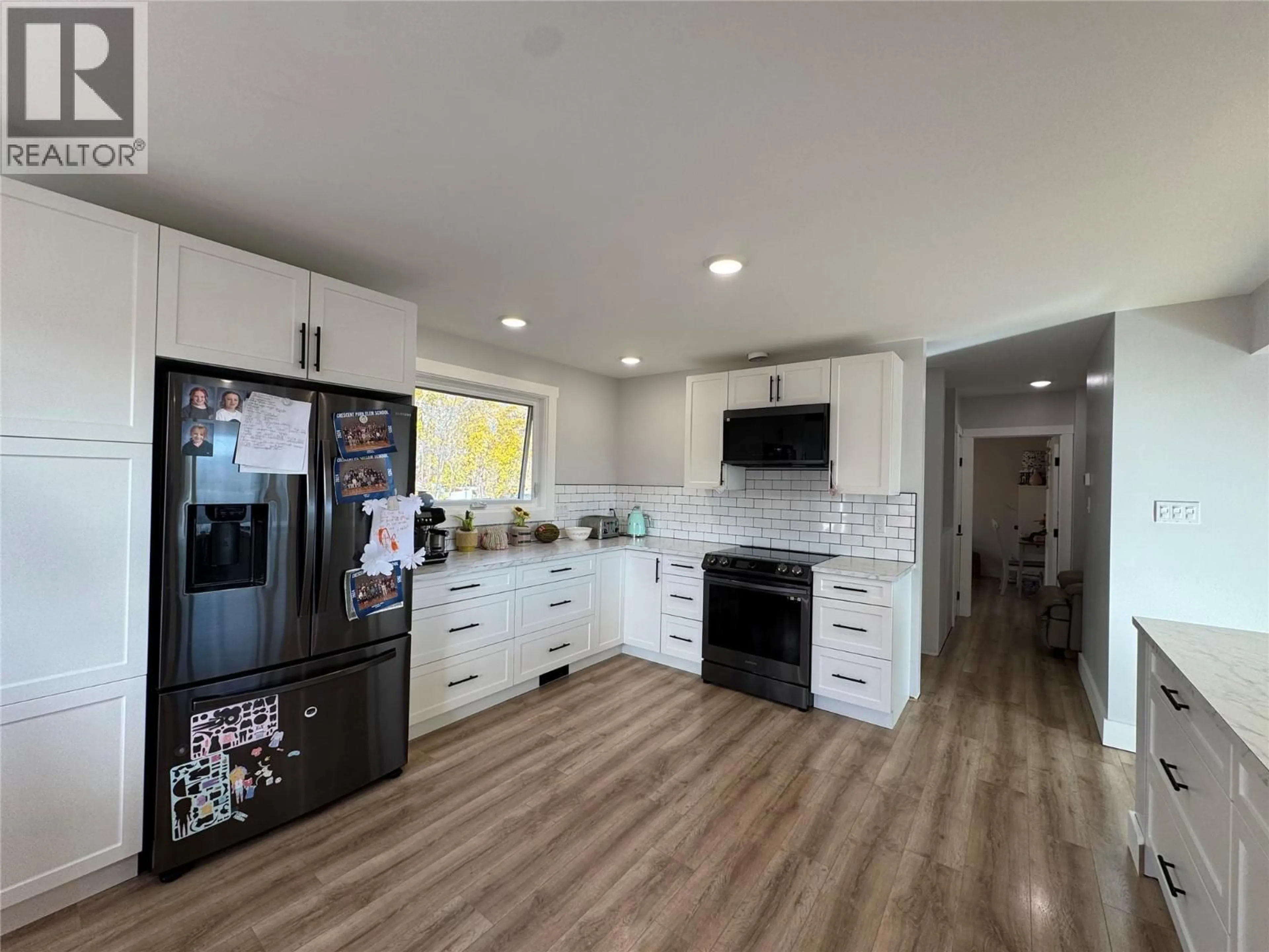 Open concept kitchen, unknown for 1420 94 AVENUE, Dawson Creek British Columbia V1G1G8