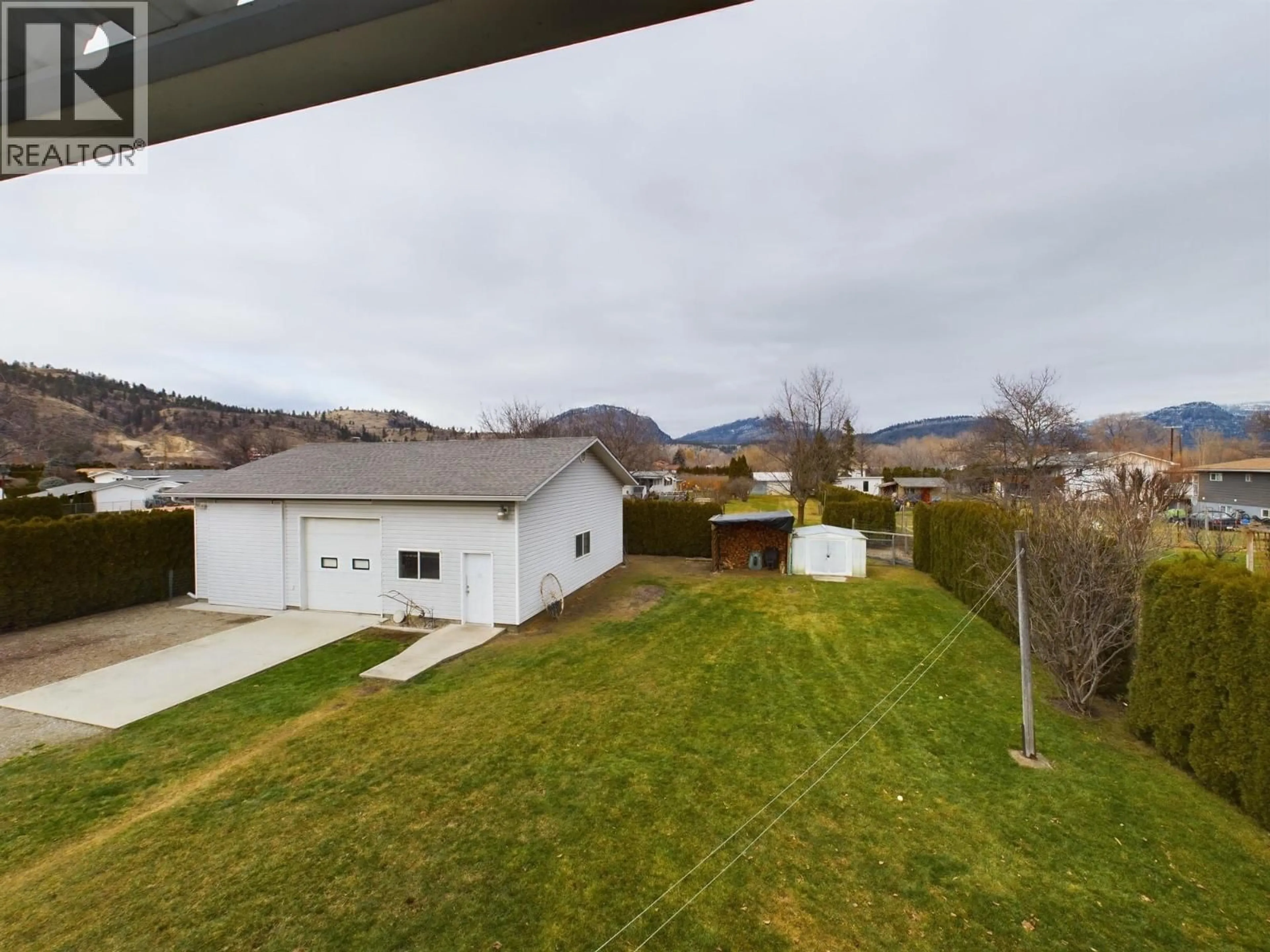 A pic from outside/outdoor area/front of a property/back of a property/a pic from drone, mountain view for 238 PARK RILL ROAD, Oliver British Columbia V0H1T7