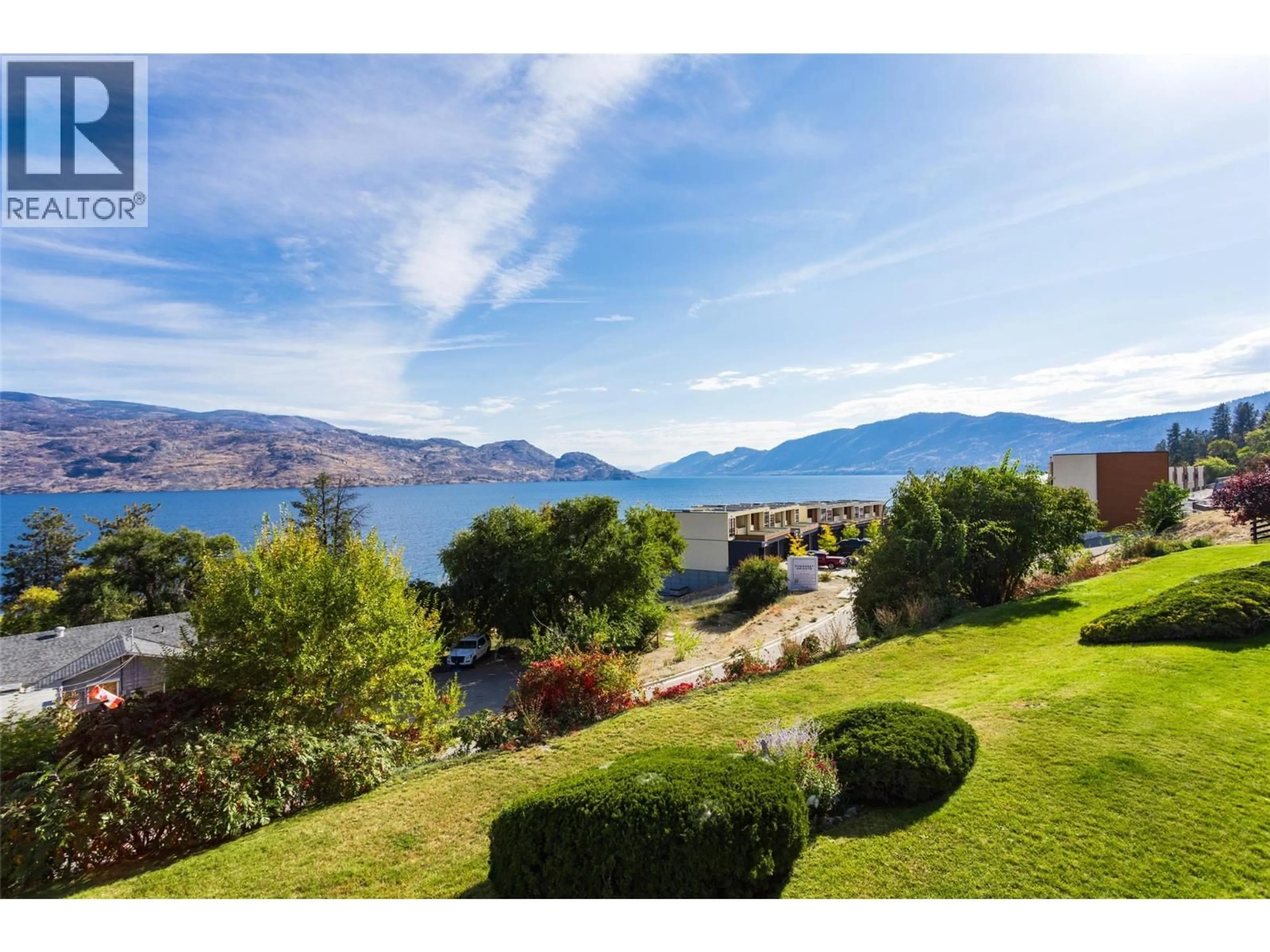 A pic from outside/outdoor area/front of a property/back of a property/a pic from drone, water/lake/river/ocean view for 104 - 5970 PRINCESS STREET, Peachland British Columbia V0H1X0