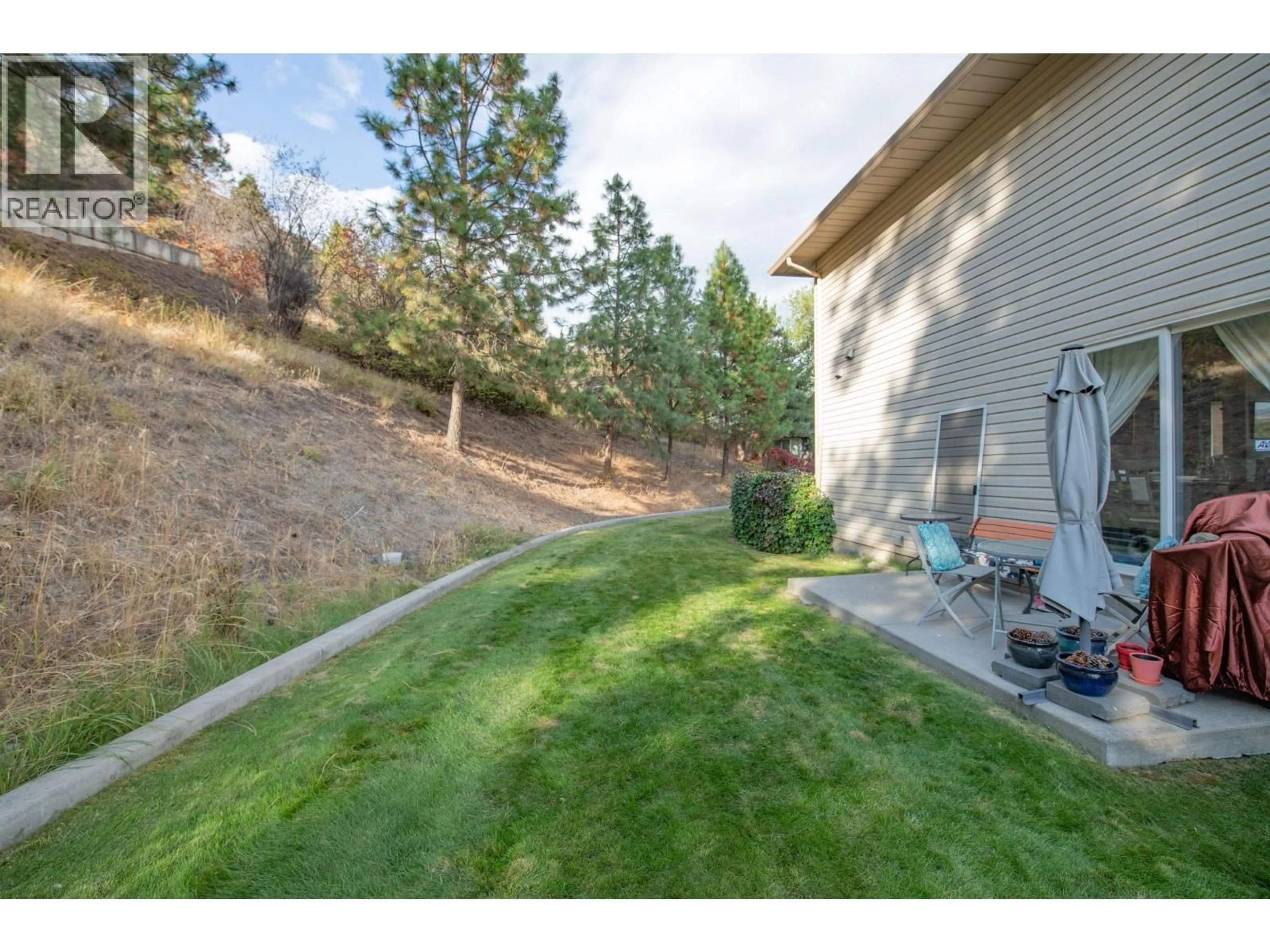Patio, forest/trees view for 203 - 4202 ALEXIS PARK DRIVE, Vernon British Columbia V1T6H3