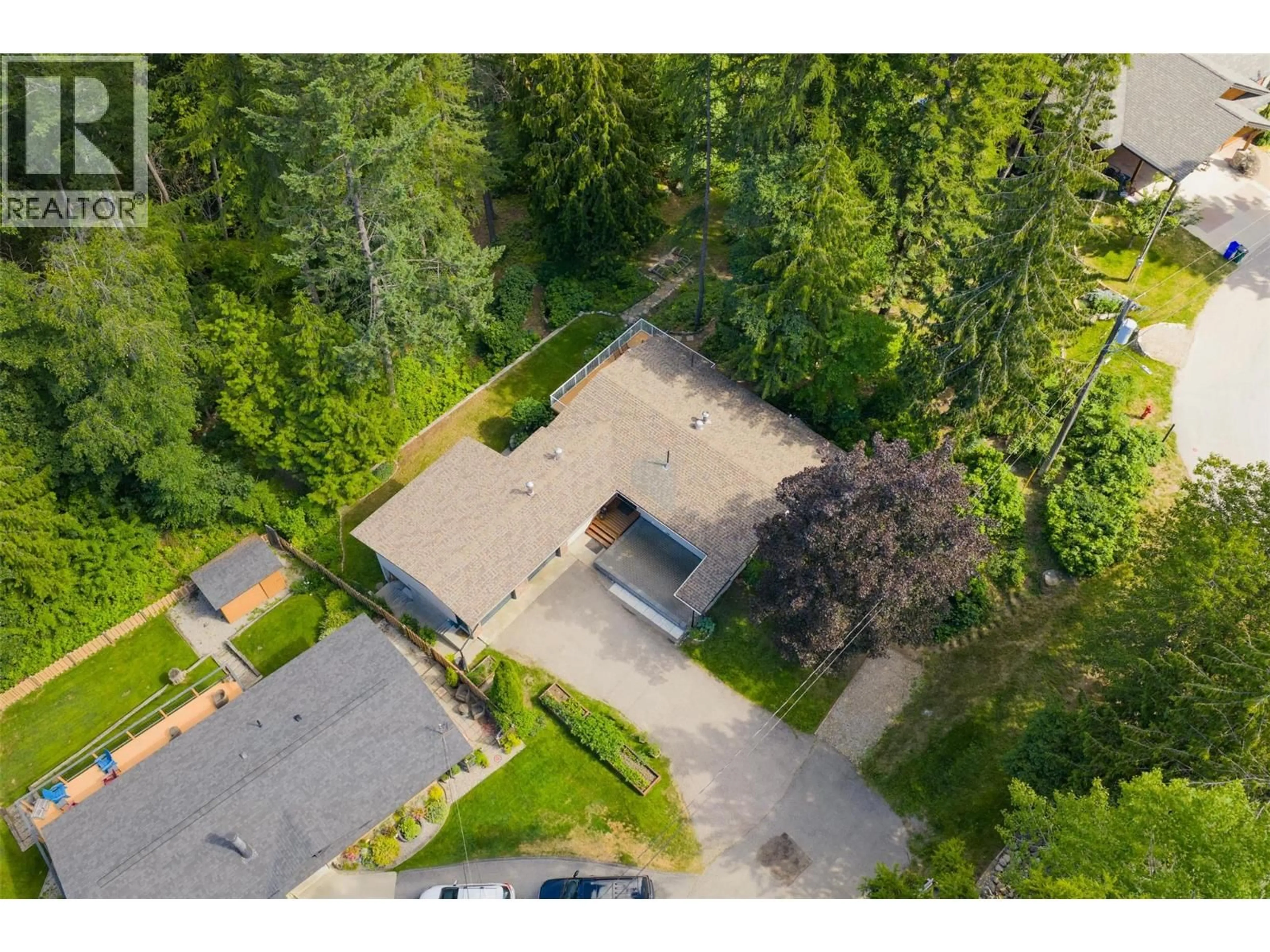 A pic from outside/outdoor area/front of a property/back of a property/a pic from drone, forest/trees view for 2707 MAPLE CRESCENT, Rossland British Columbia V0G1Y0