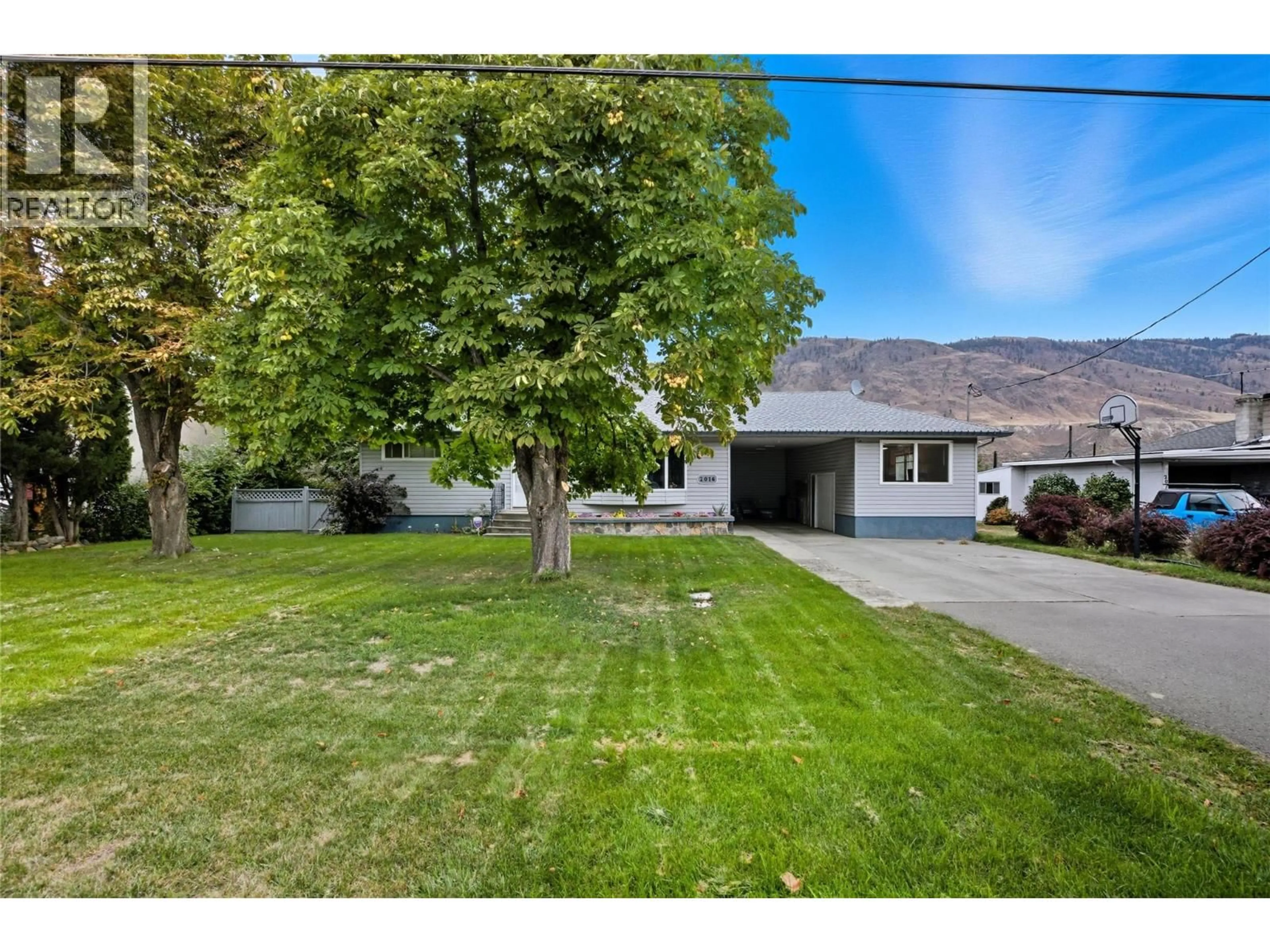 A pic from outside/outdoor area/front of a property/back of a property/a pic from drone, mountain view for 2016 GLENWOOD DRIVE, Kamloops British Columbia V2C4G6