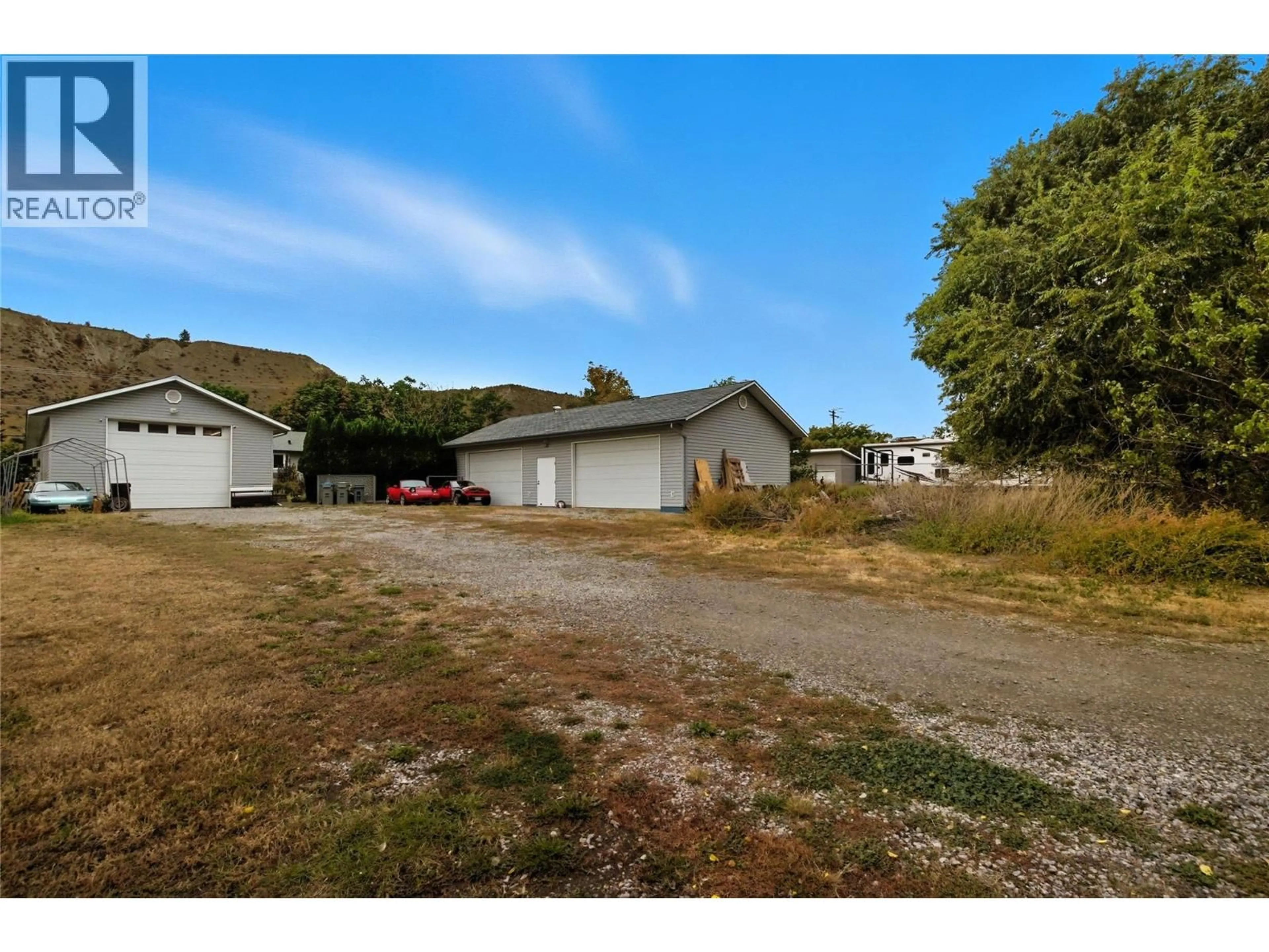 A pic from outside/outdoor area/front of a property/back of a property/a pic from drone, street for 2016 GLENWOOD DRIVE, Kamloops British Columbia V2C4G6