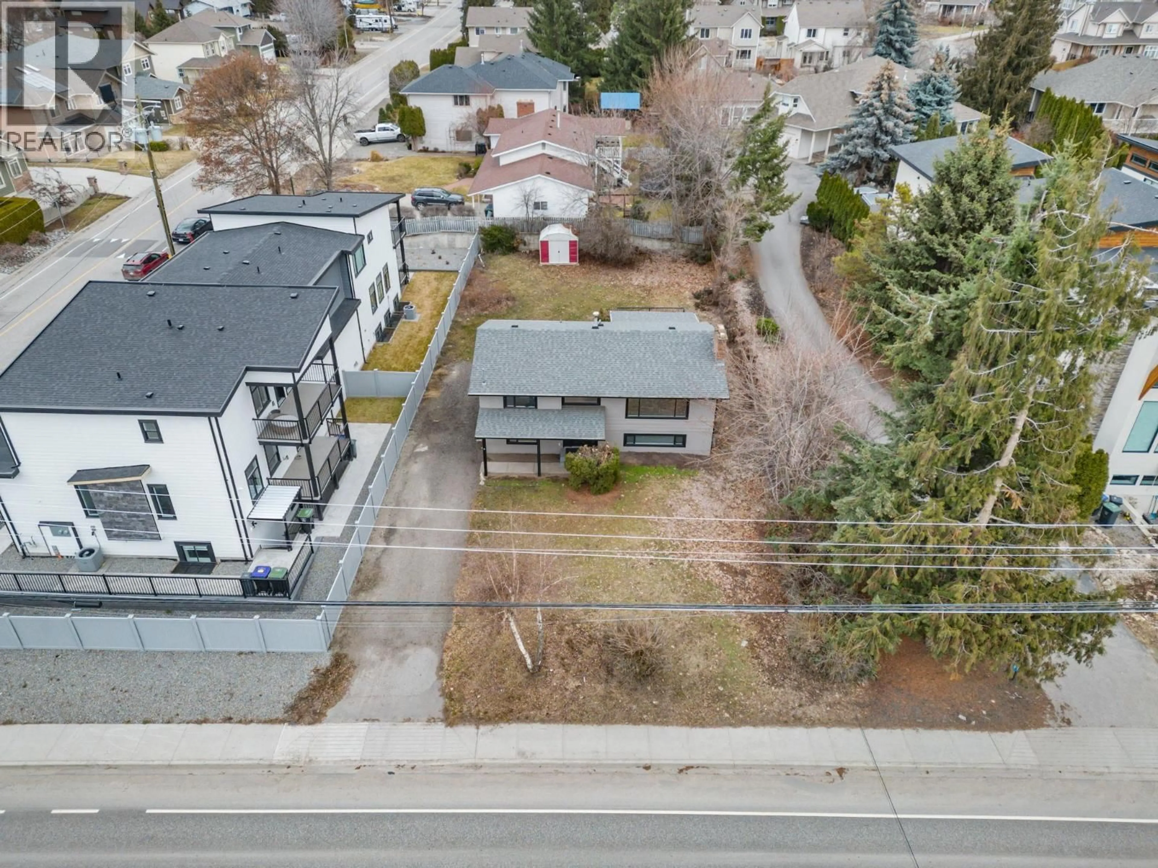 A pic from outside/outdoor area/front of a property/back of a property/a pic from drone, street for 4611 GORDON DRIVE, Kelowna British Columbia V1W1T5