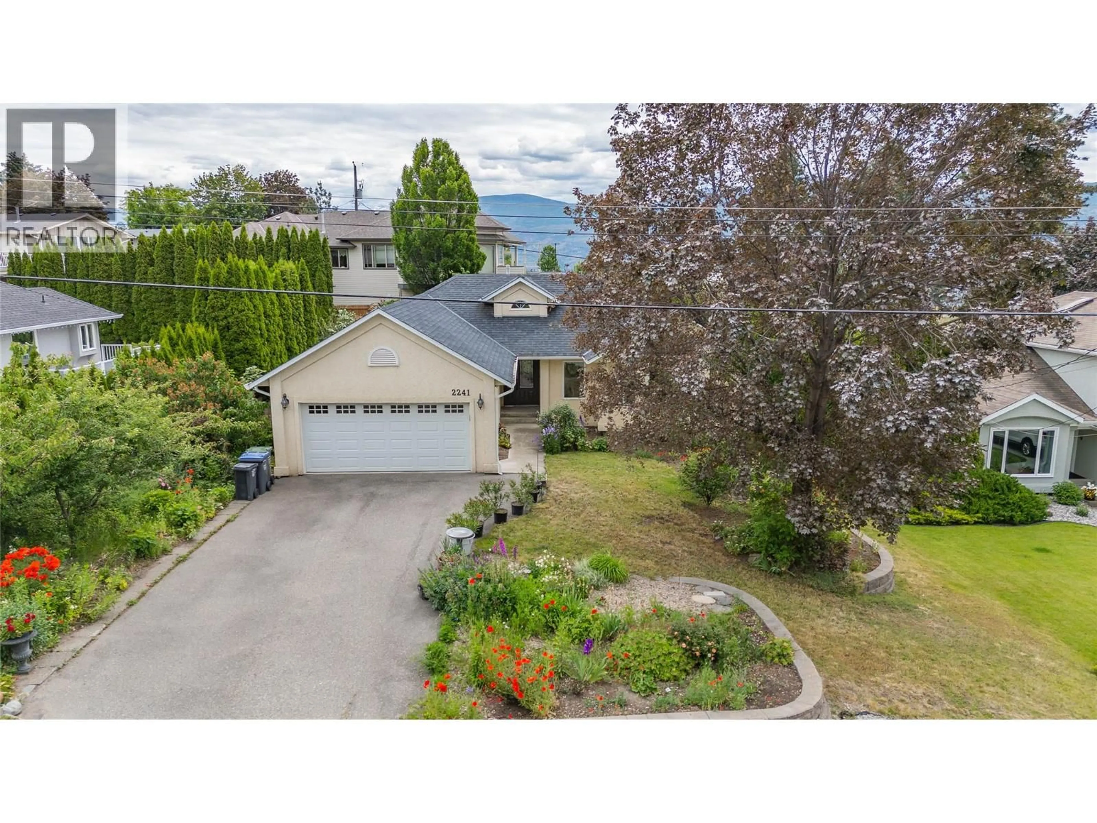 A pic from outside/outdoor area/front of a property/back of a property/a pic from drone, street for 2241 MAJOROS ROAD, West Kelowna British Columbia V4T2C2
