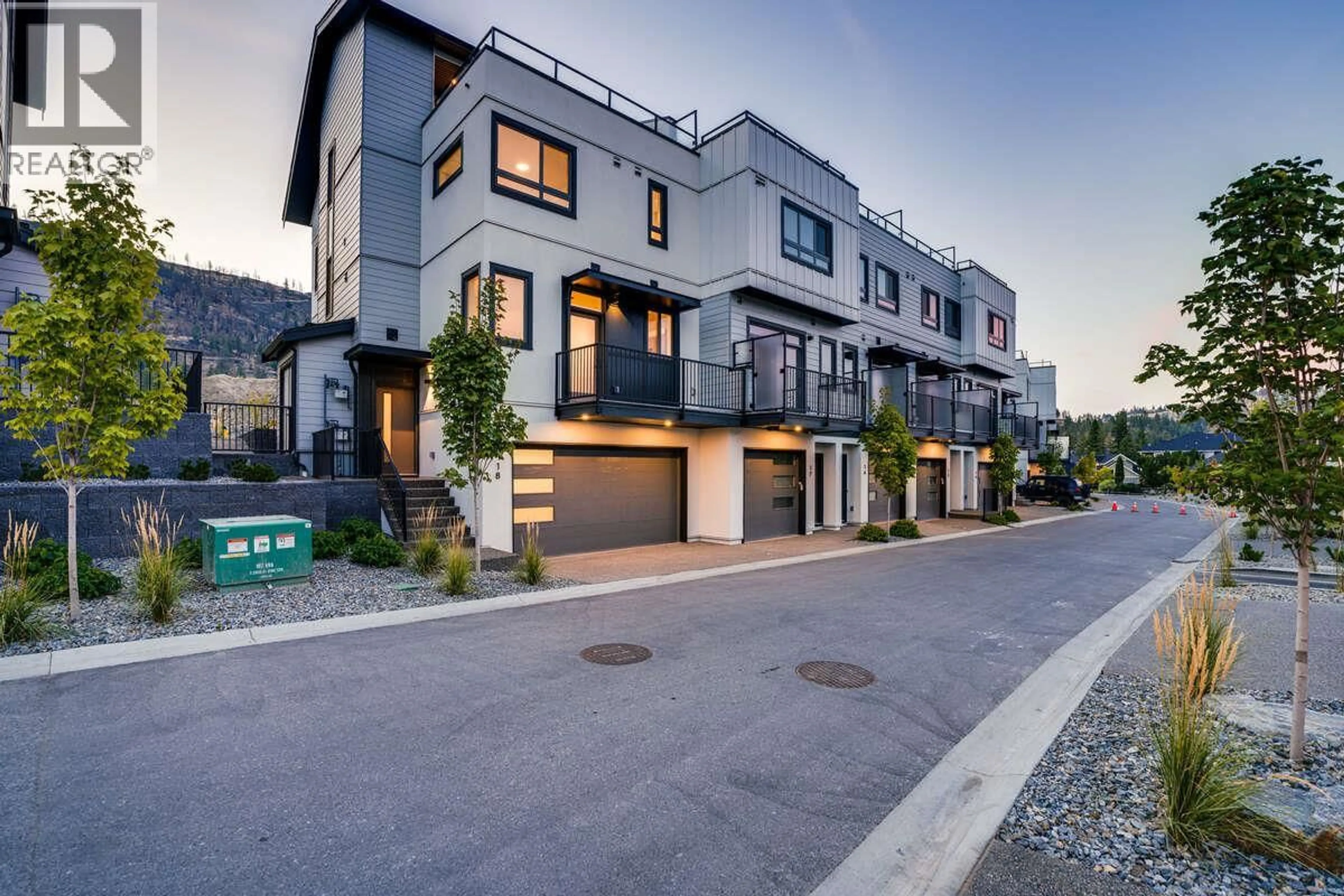 Home with brick exterior material, street for 18 - 1550 UNION ROAD, Kelowna British Columbia V1V2W4