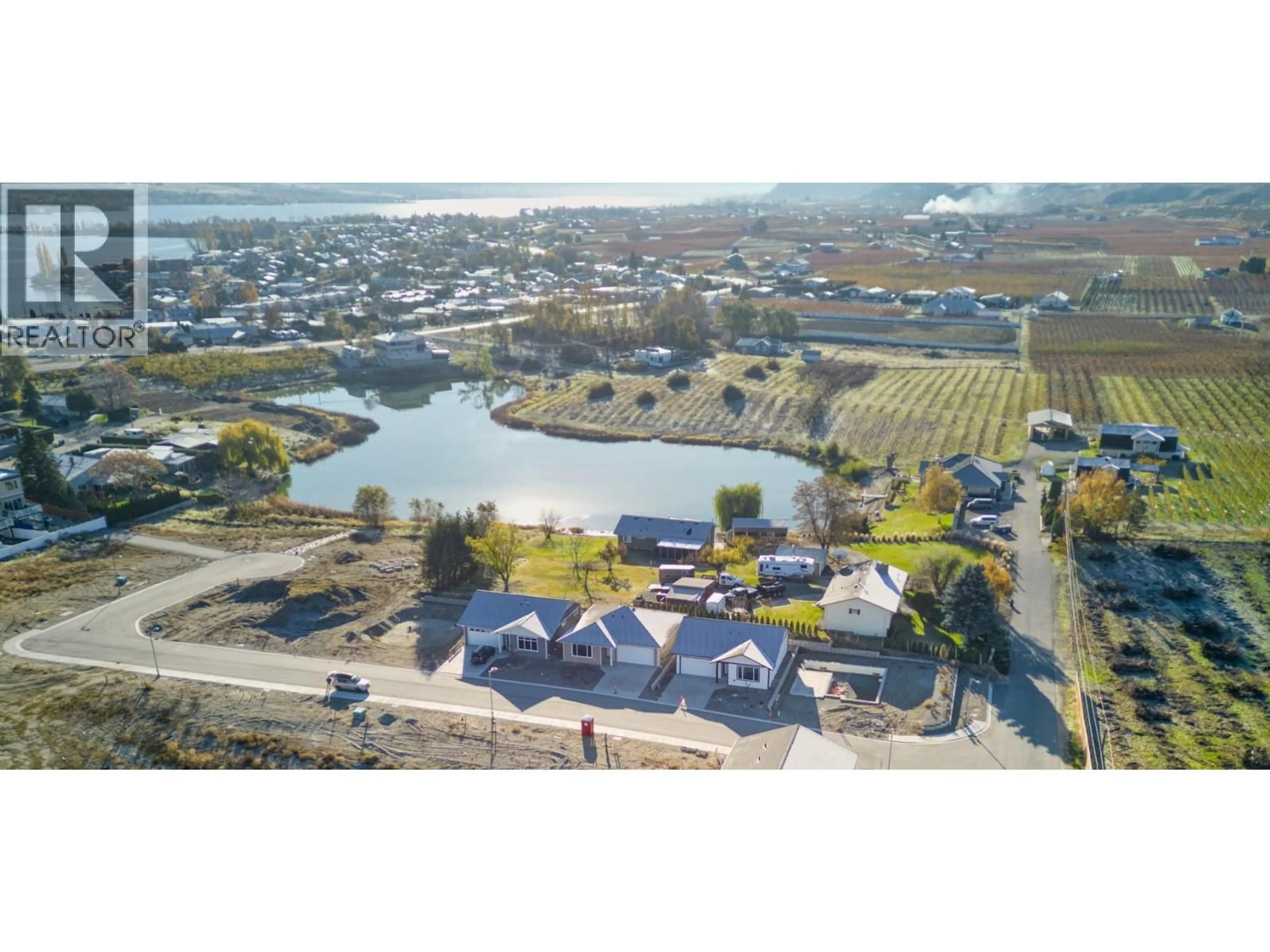A pic from outside/outdoor area/front of a property/back of a property/a pic from drone, water/lake/river/ocean view for 3 WOOD DUCK WAY, Osoyoos British Columbia V0H1V5