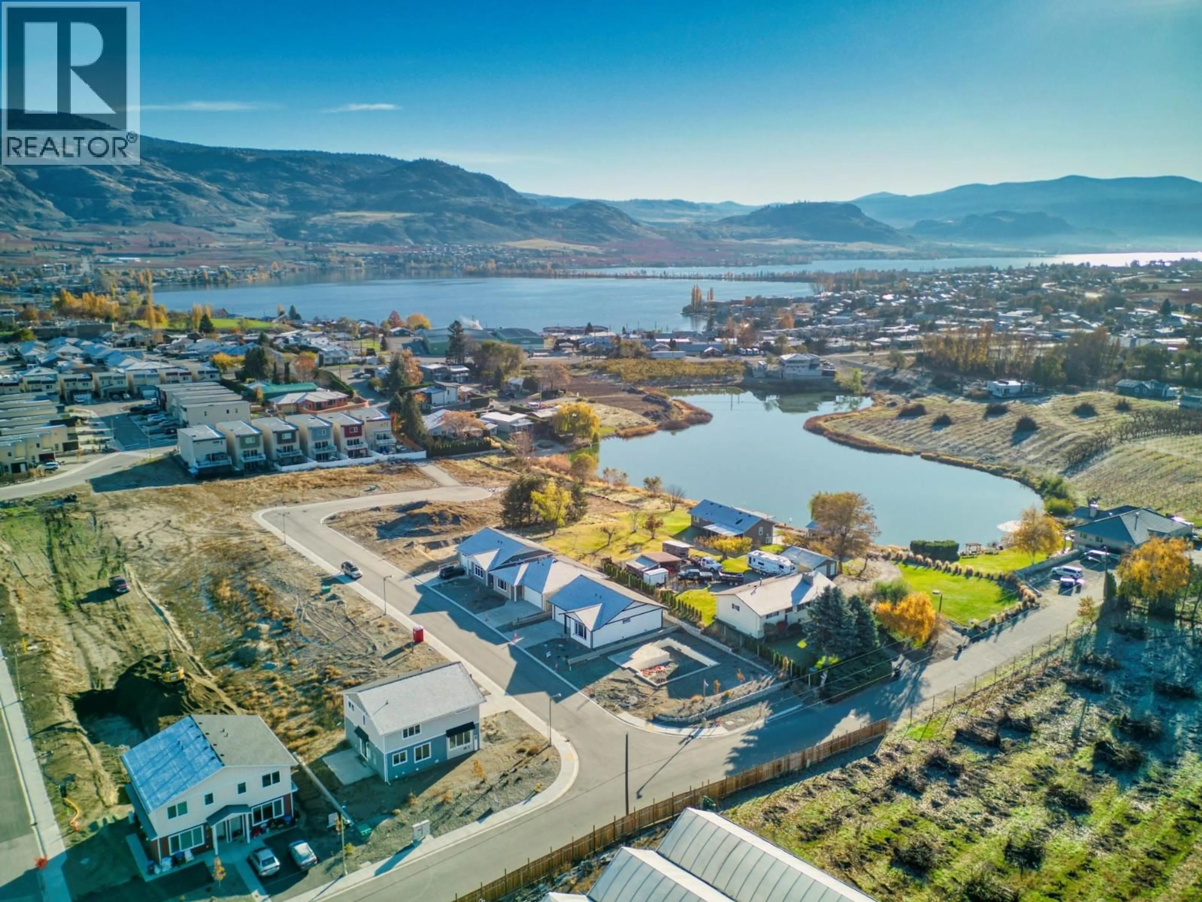 A pic from outside/outdoor area/front of a property/back of a property/a pic from drone, water/lake/river/ocean view for 3 WOOD DUCK WAY, Osoyoos British Columbia V0H1V5