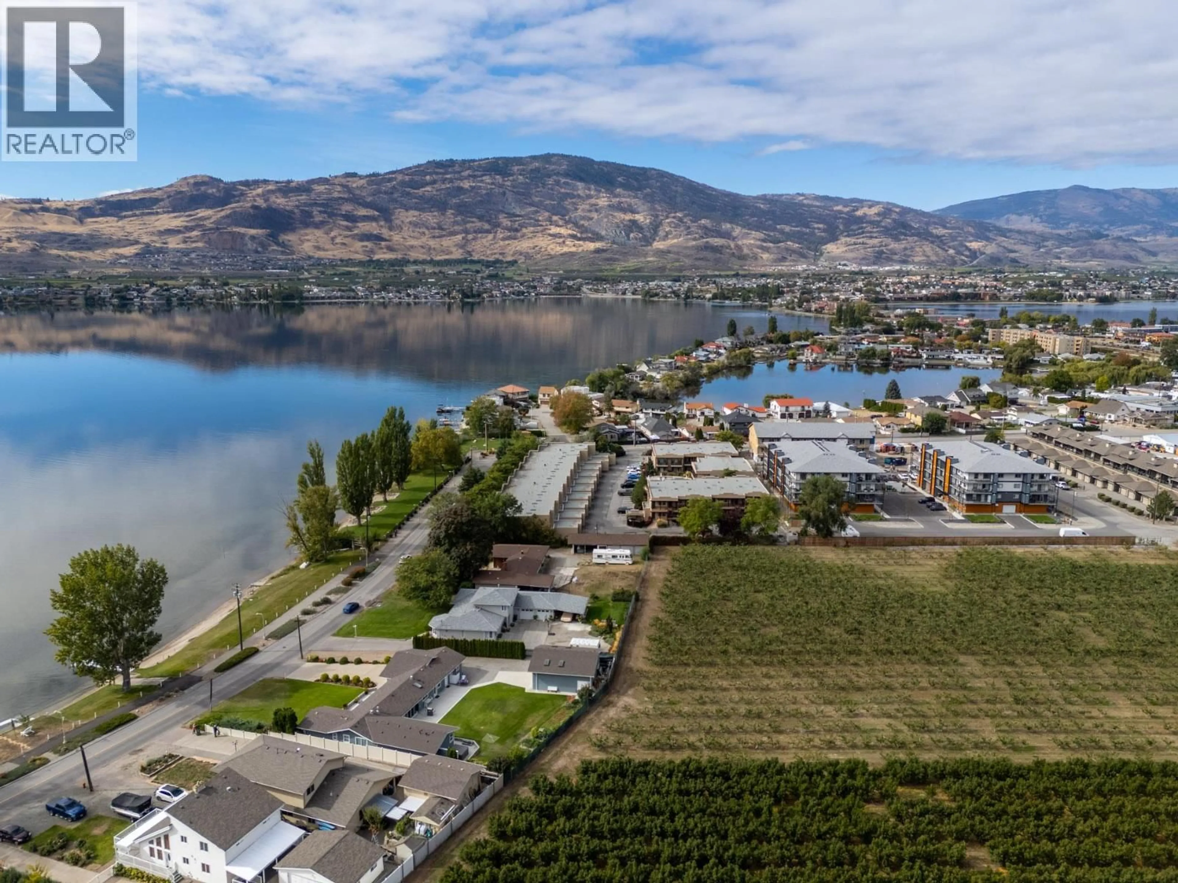 A pic from outside/outdoor area/front of a property/back of a property/a pic from drone, water/lake/river/ocean view for 104 - 5401 LAKESHORE DRIVE, Osoyoos British Columbia V0H1V6