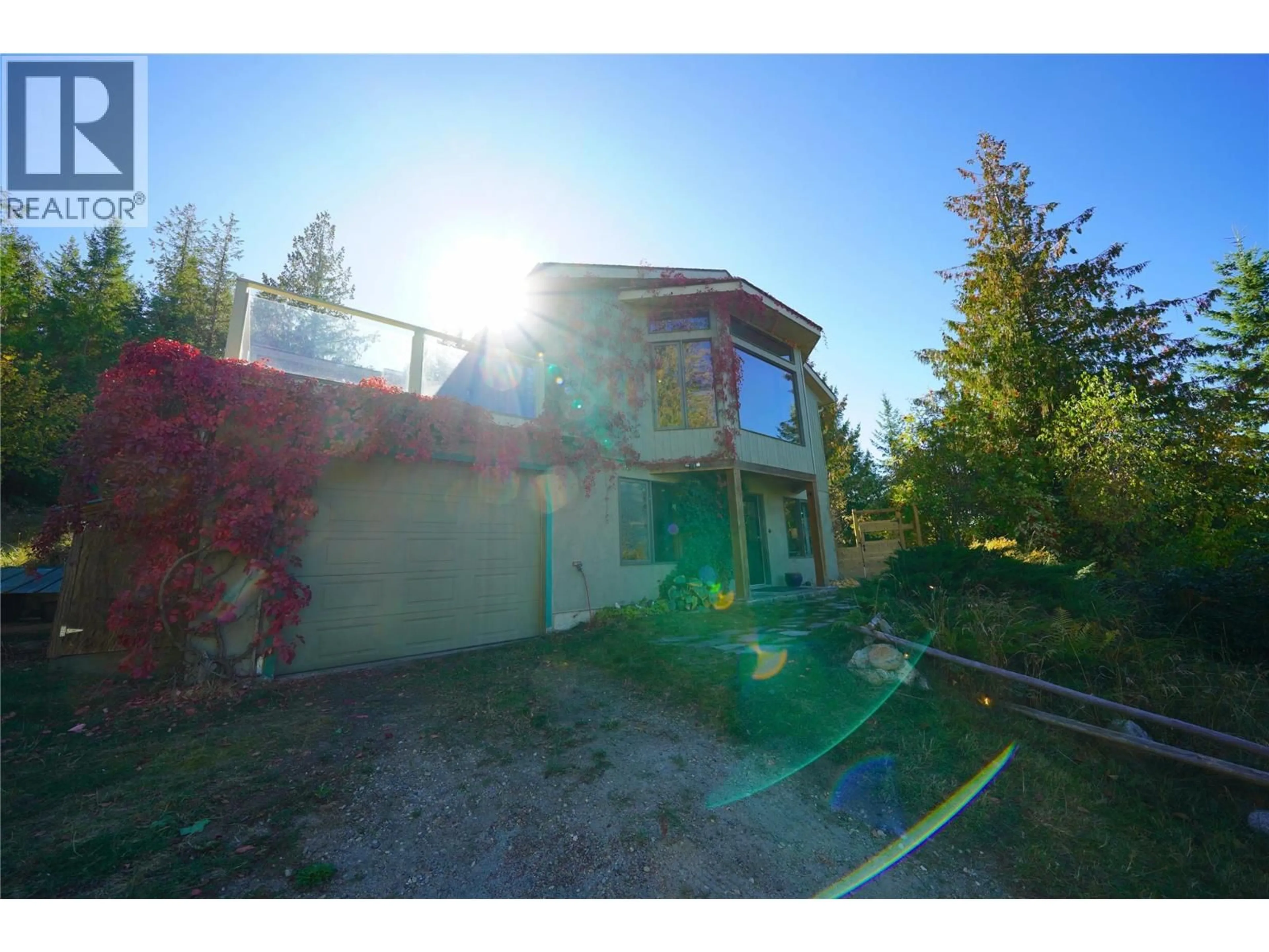 A pic from outside/outdoor area/front of a property/back of a property/a pic from drone, unknown for 230 RAINBOW RIDGE ROAD, Procter British Columbia V1L0B7