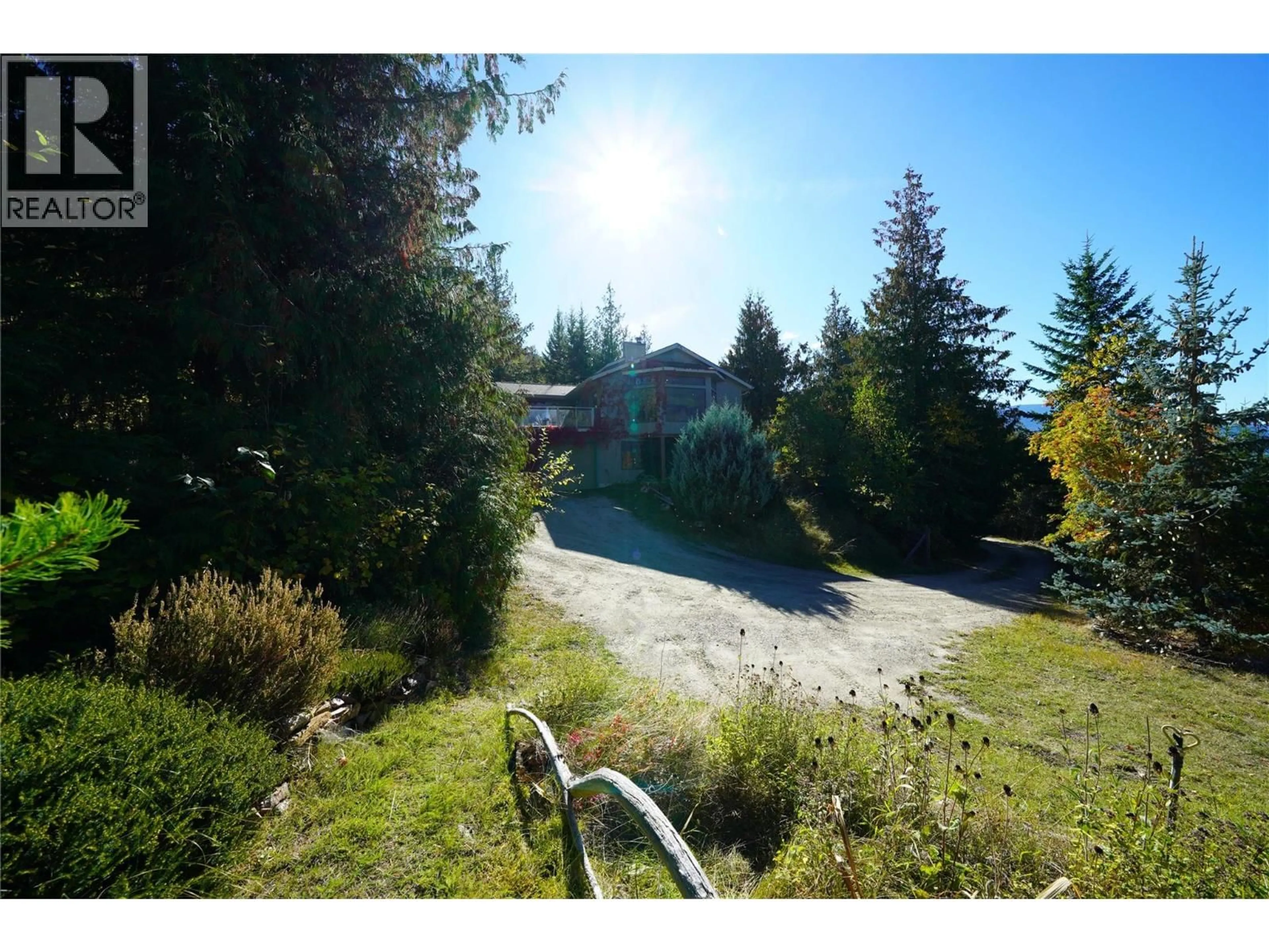 A pic from outside/outdoor area/front of a property/back of a property/a pic from drone, water/lake/river/ocean view for 230 RAINBOW RIDGE ROAD, Procter British Columbia V1L0B7