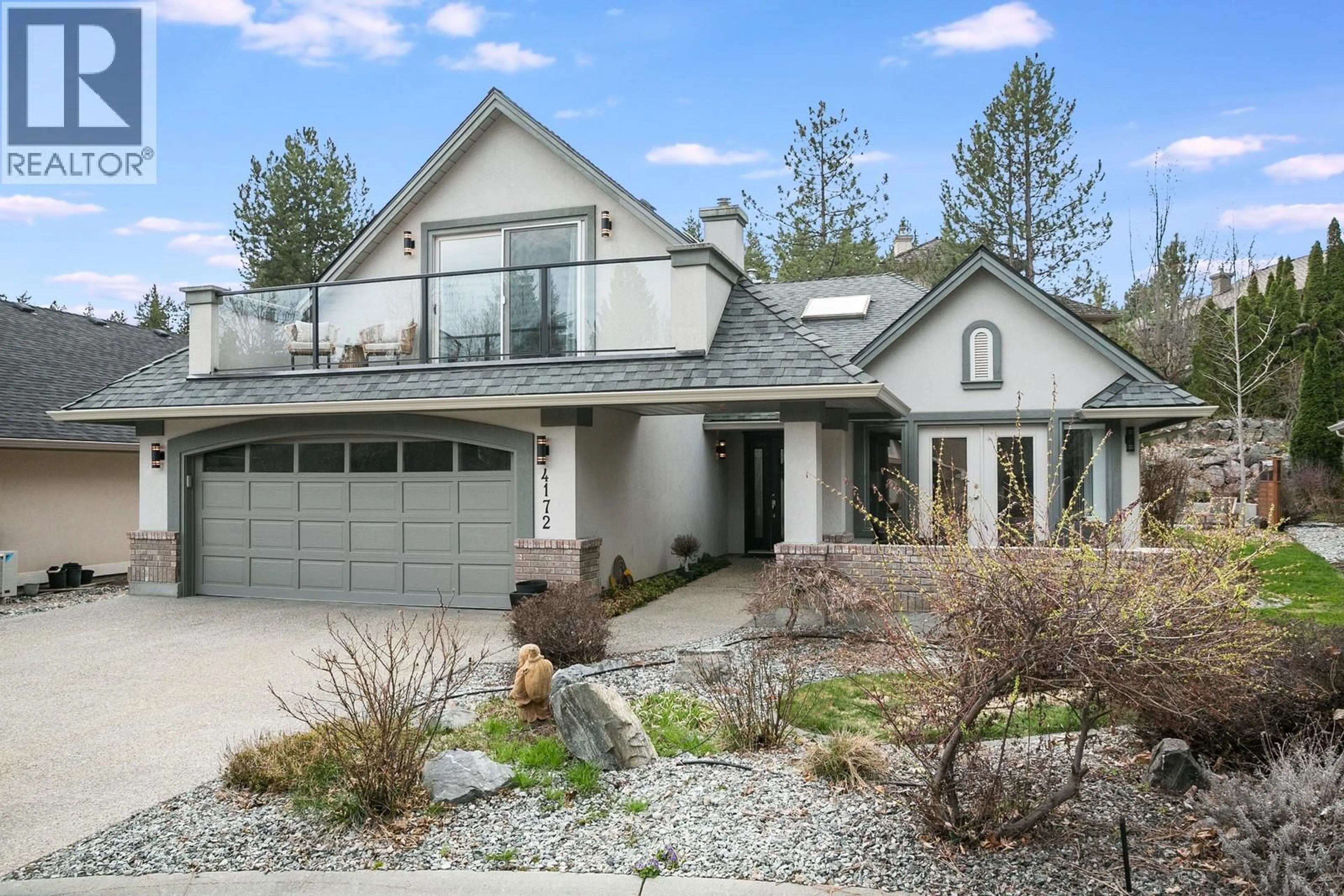 Home with vinyl exterior material, mountain view for 4172 GALLAGHERS GROVE, Kelowna British Columbia V1W3Z9