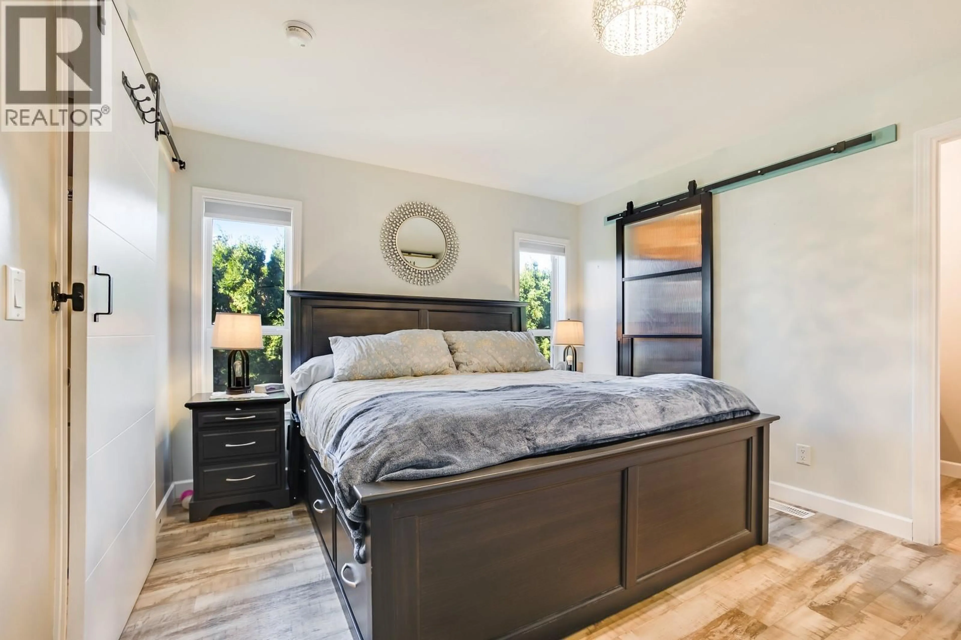 Bedroom with bed, wood/laminate floor for 145 - 1133 FINDLAY ROAD, Kelowna British Columbia V1X5A9
