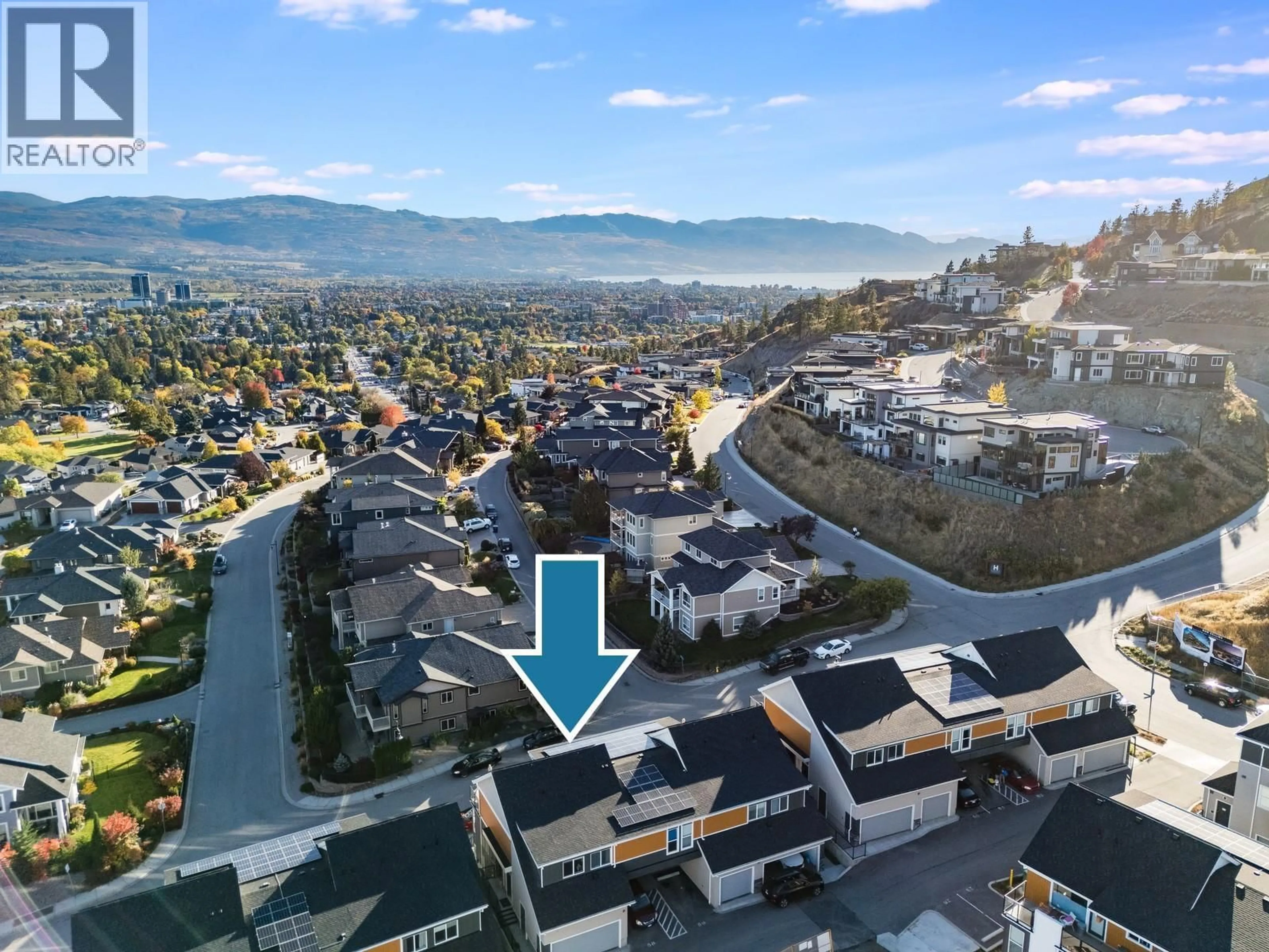 A pic from outside/outdoor area/front of a property/back of a property/a pic from drone, mountain view for 85 - 685 BOYNTON PLACE, Kelowna British Columbia V1V2Z4