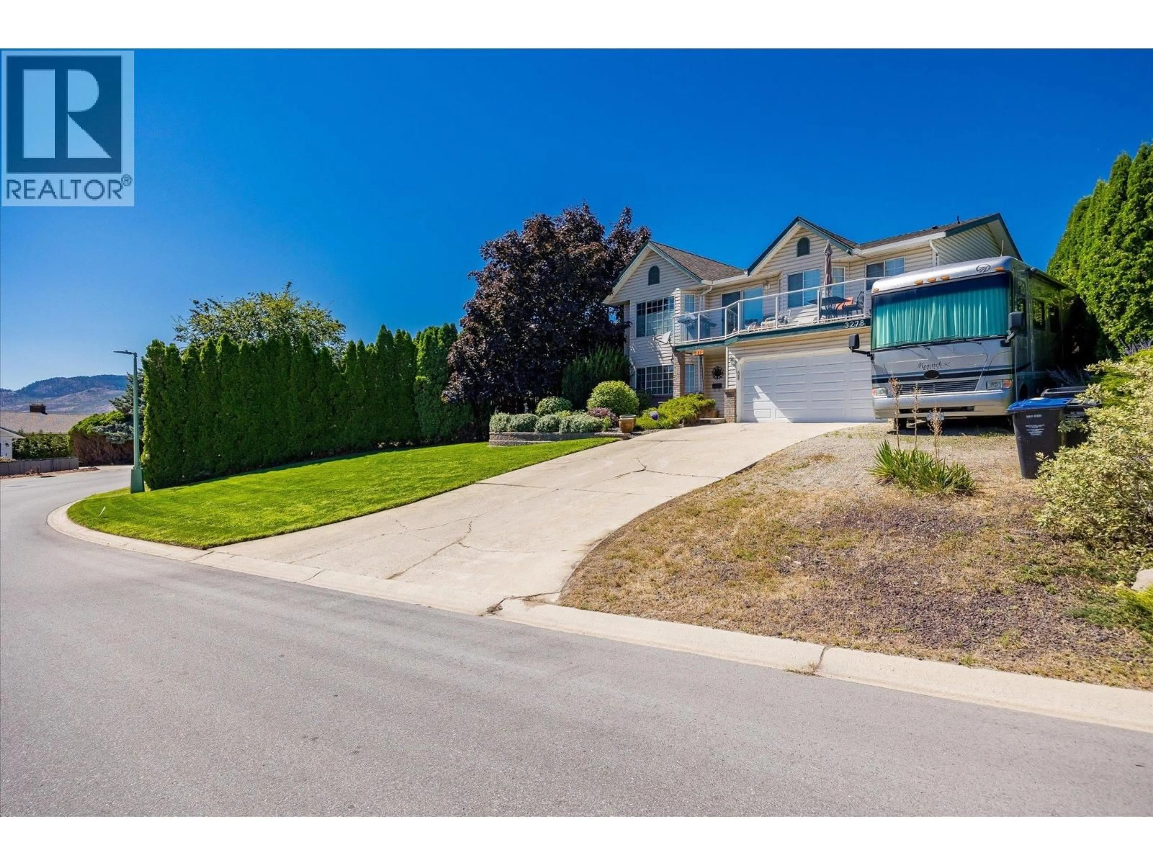 A pic from outside/outdoor area/front of a property/back of a property/a pic from drone, street for 3278 SUNDANCE DRIVE, West Kelowna British Columbia V4T1S4