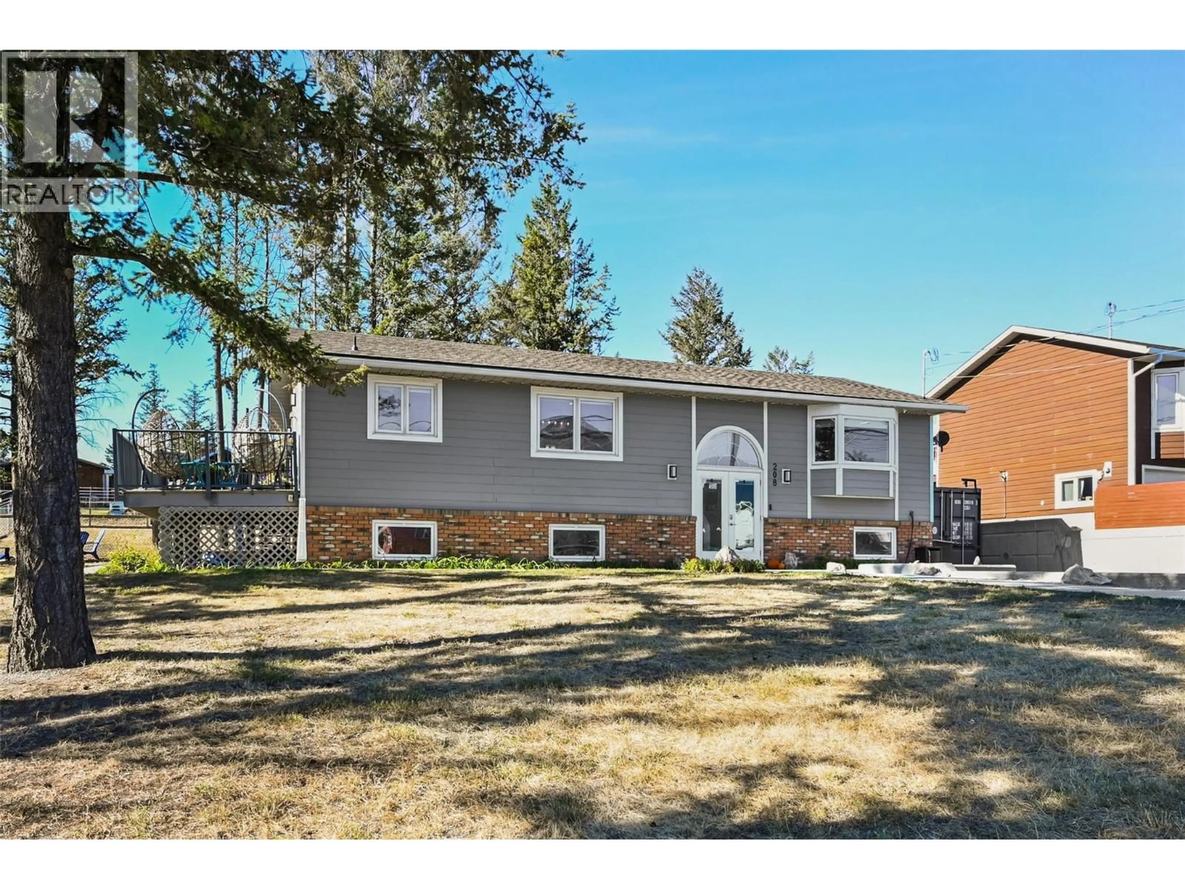 Home with vinyl exterior material, street for 208 7TH AVENUE, Invermere British Columbia V0A1K4