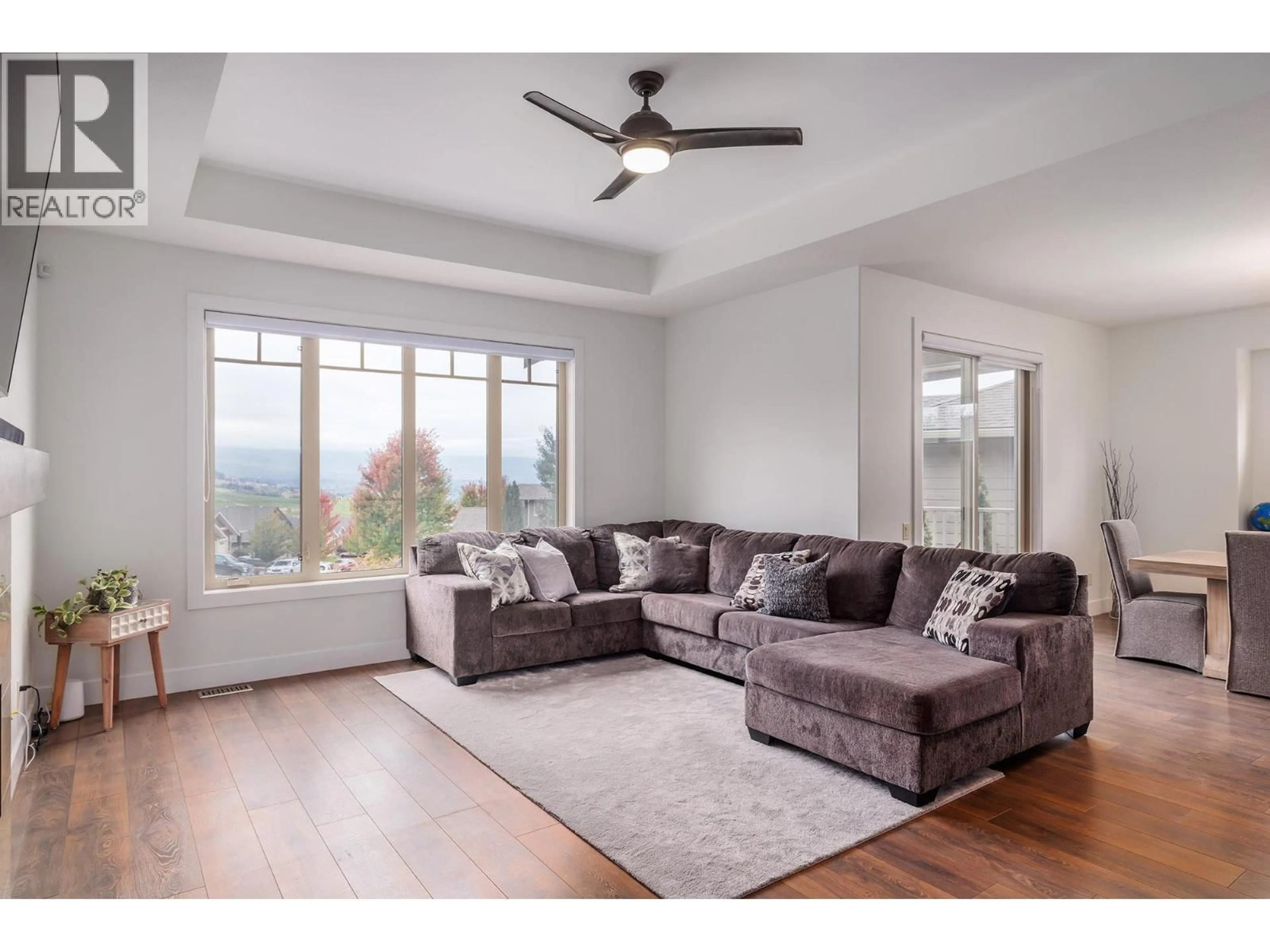 Living room with furniture, unknown for 1858 SPLIT RAIL PLACE, Kelowna British Columbia V1P1R1