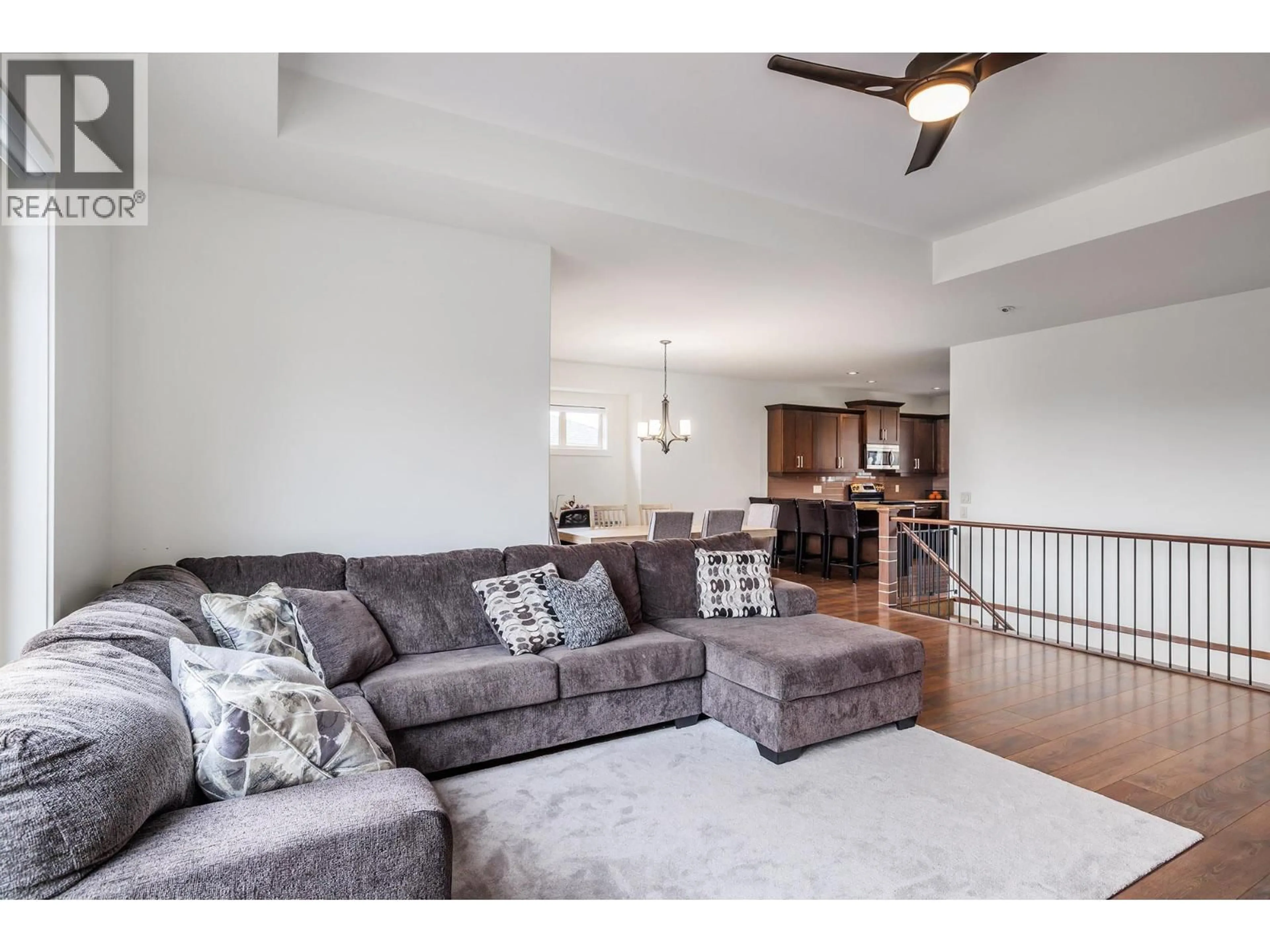 Living room with furniture, unknown for 1858 SPLIT RAIL PLACE, Kelowna British Columbia V1P1R1