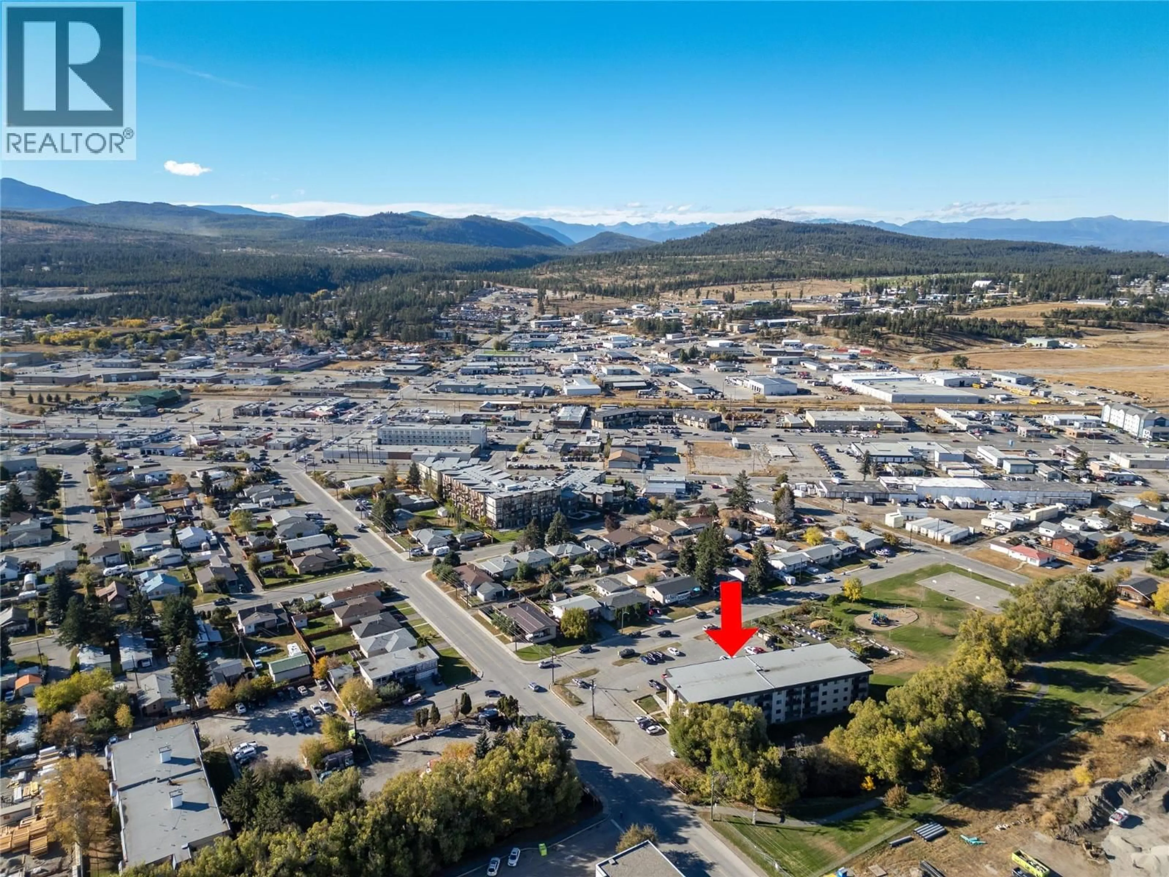 A pic from outside/outdoor area/front of a property/back of a property/a pic from drone, mountain view for 406 - 606 18TH  N AVENUE, Cranbrook British Columbia V1C5M1