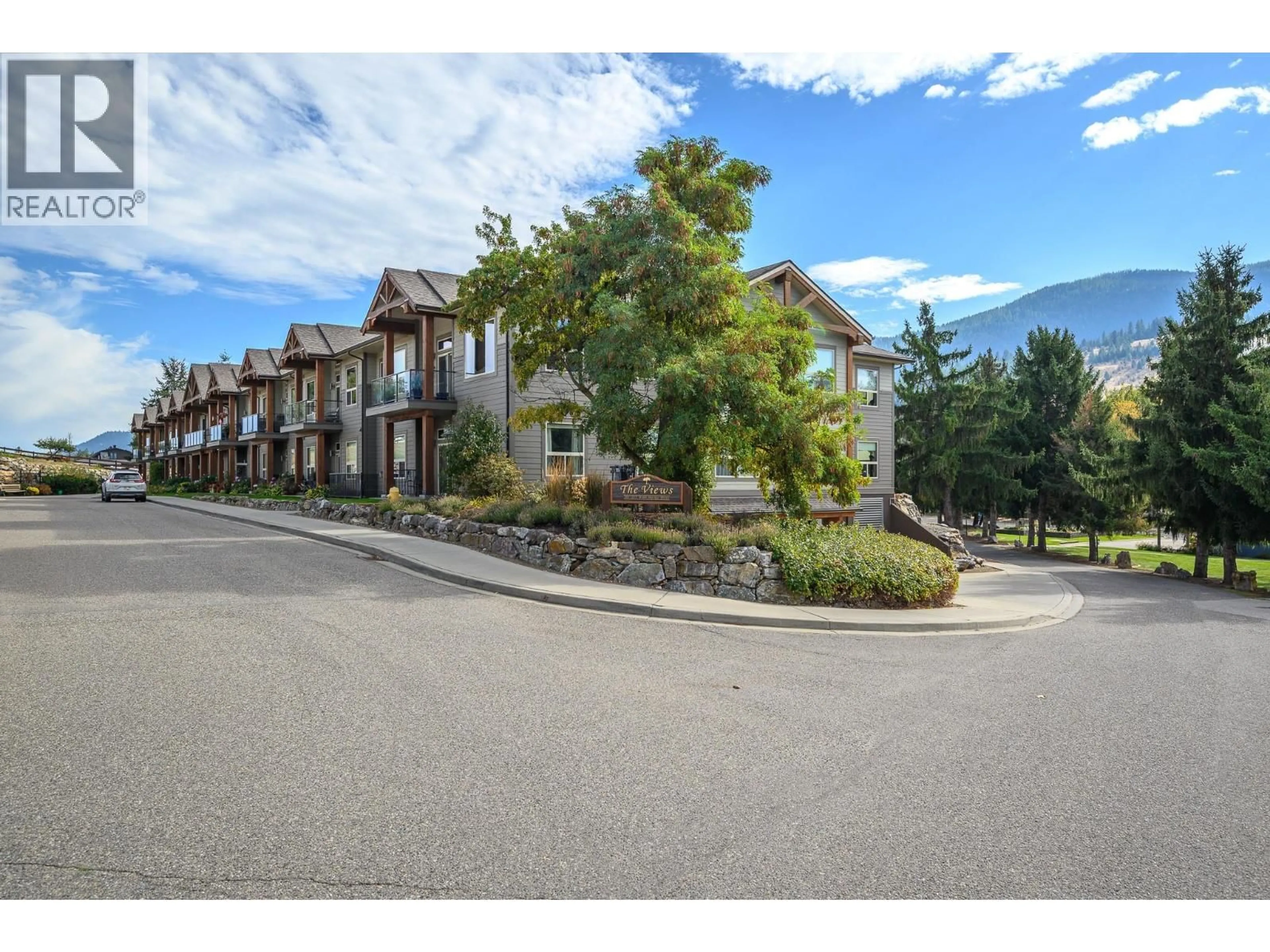A pic from outside/outdoor area/front of a property/back of a property/a pic from drone, mountain view for 212 - 9100 MACKIE DRIVE, Coldstream British Columbia V1B1G9