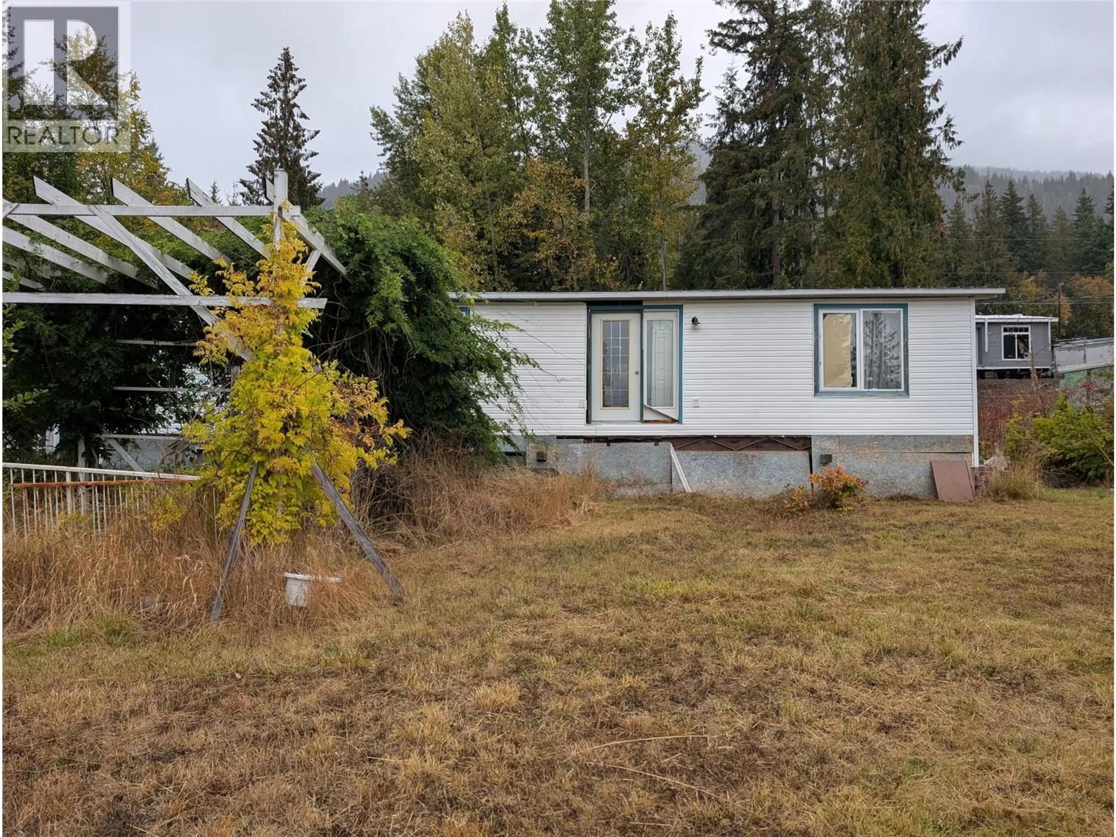 Home with vinyl exterior material, unknown for 7429 STAMPEDE TRAIL, Anglemont British Columbia V0E1M8