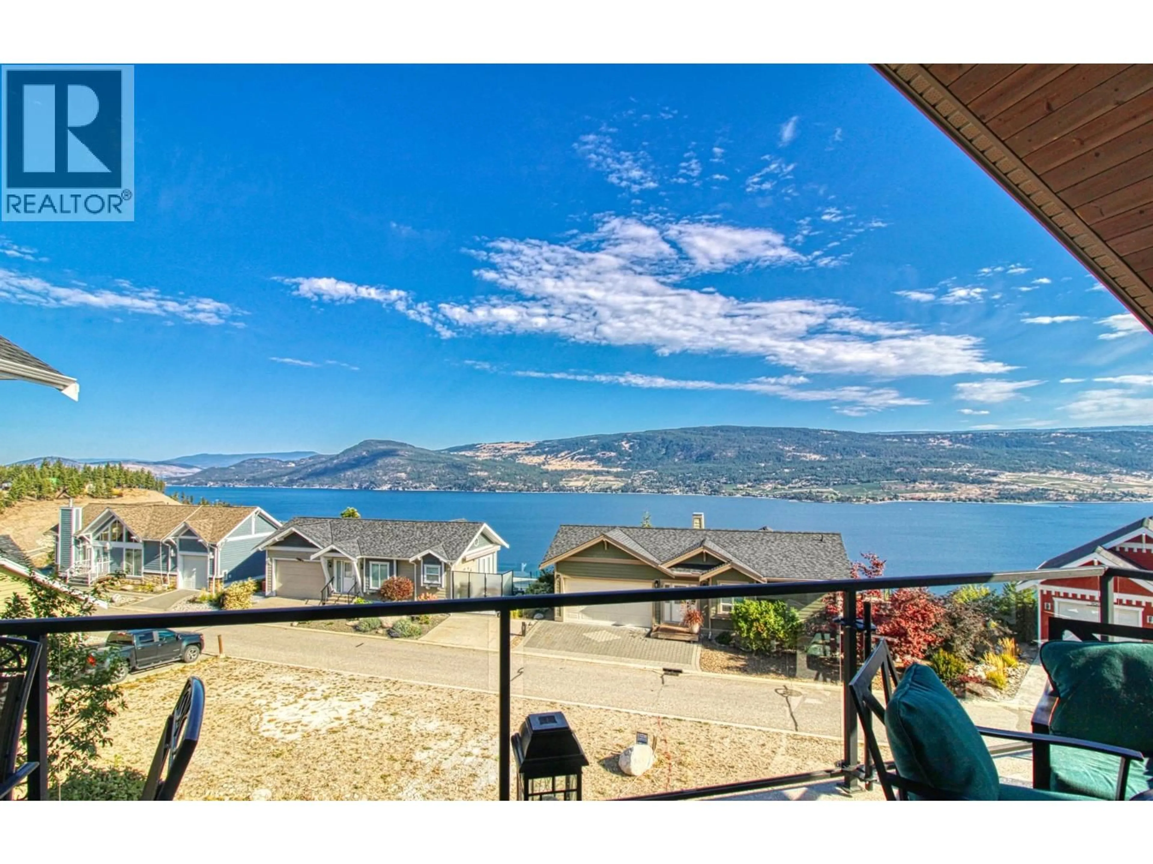 A pic from outside/outdoor area/front of a property/back of a property/a pic from drone, water/lake/river/ocean view for 440 - 6969 TERAZONA DRIVE, Kelowna British Columbia V1Z3R8