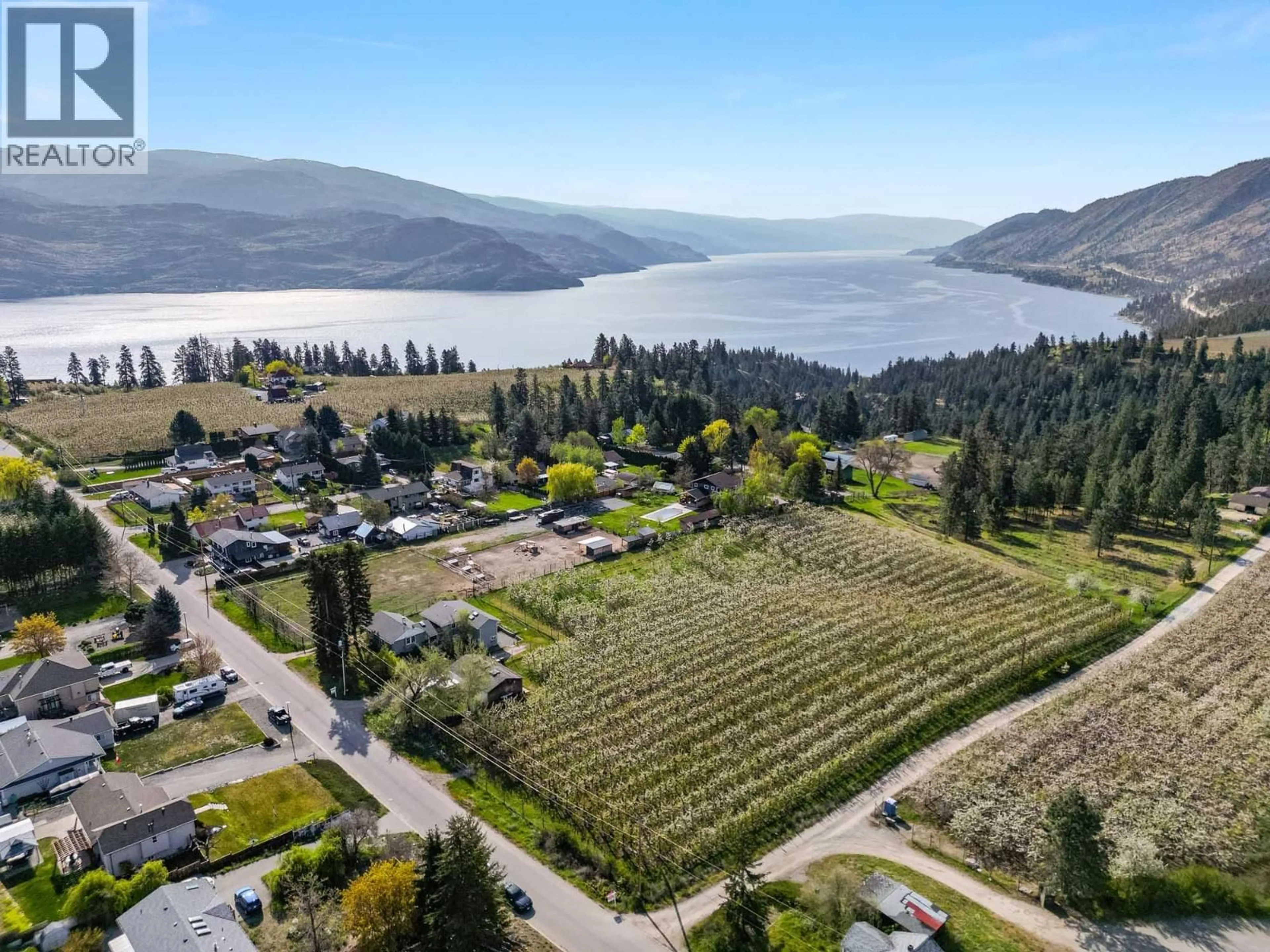 A pic from outside/outdoor area/front of a property/back of a property/a pic from drone, water/lake/river/ocean view for 5028 ELLIOTT AVENUE, Peachland British Columbia V0H1X8