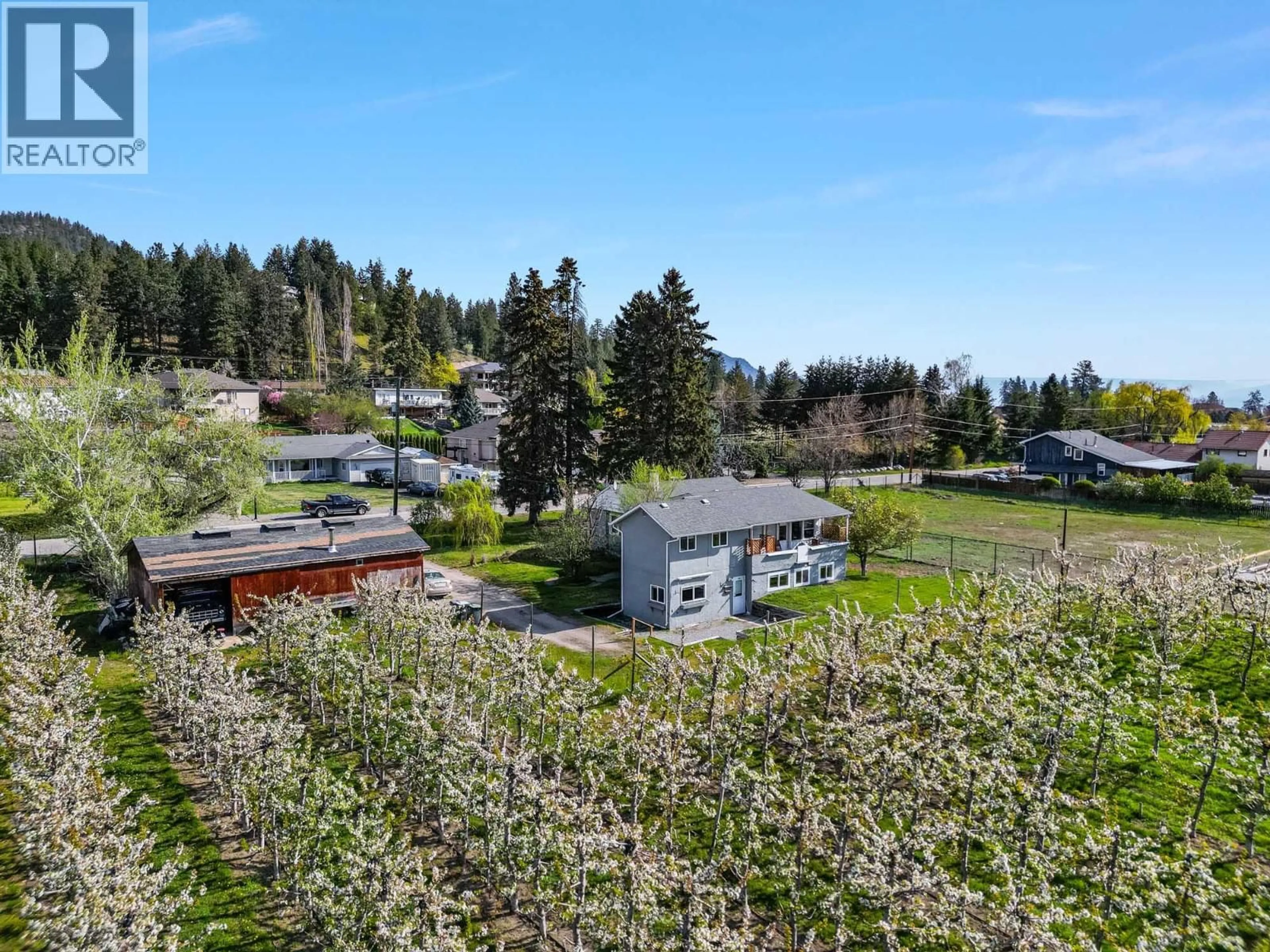 A pic from outside/outdoor area/front of a property/back of a property/a pic from drone, unknown for 5028 ELLIOTT AVENUE, Peachland British Columbia V0H1X8