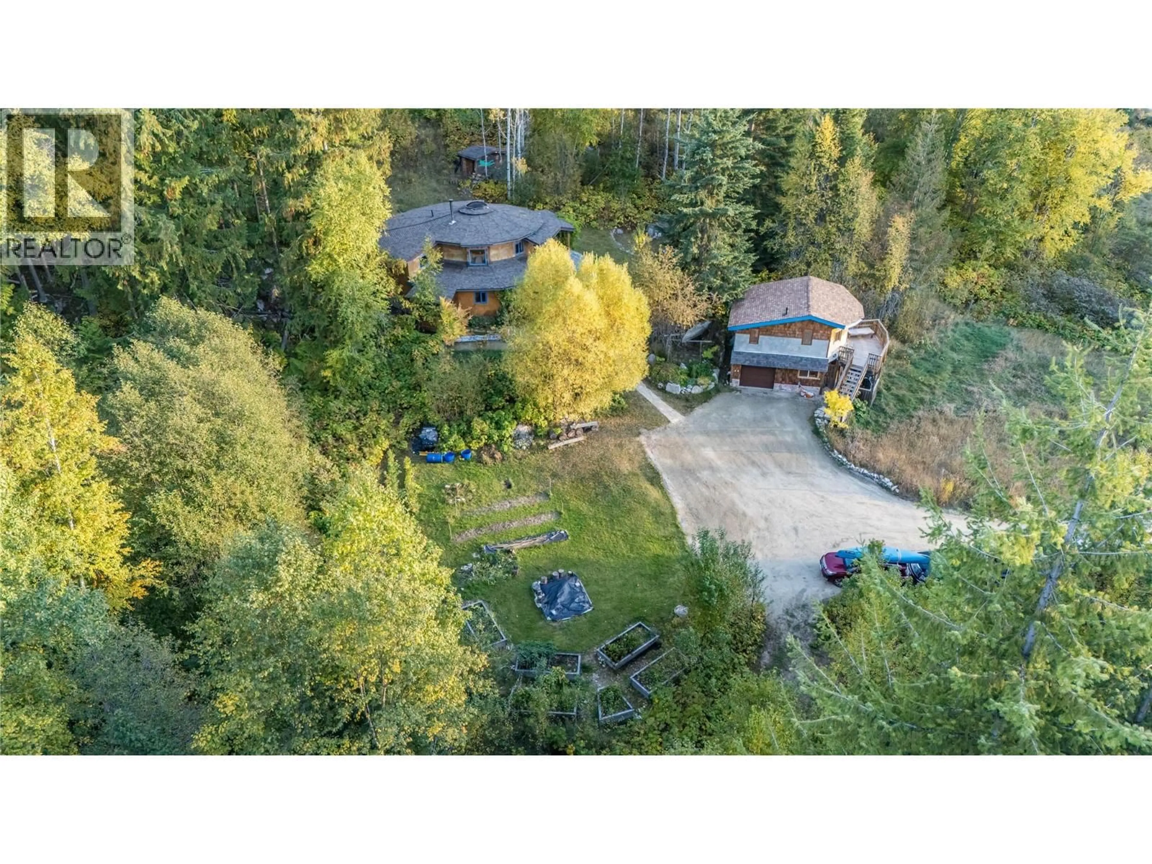 A pic from outside/outdoor area/front of a property/back of a property/a pic from drone, forest/trees view for 2129 SVOBODA ROAD, Nelson British Columbia V1L3V3