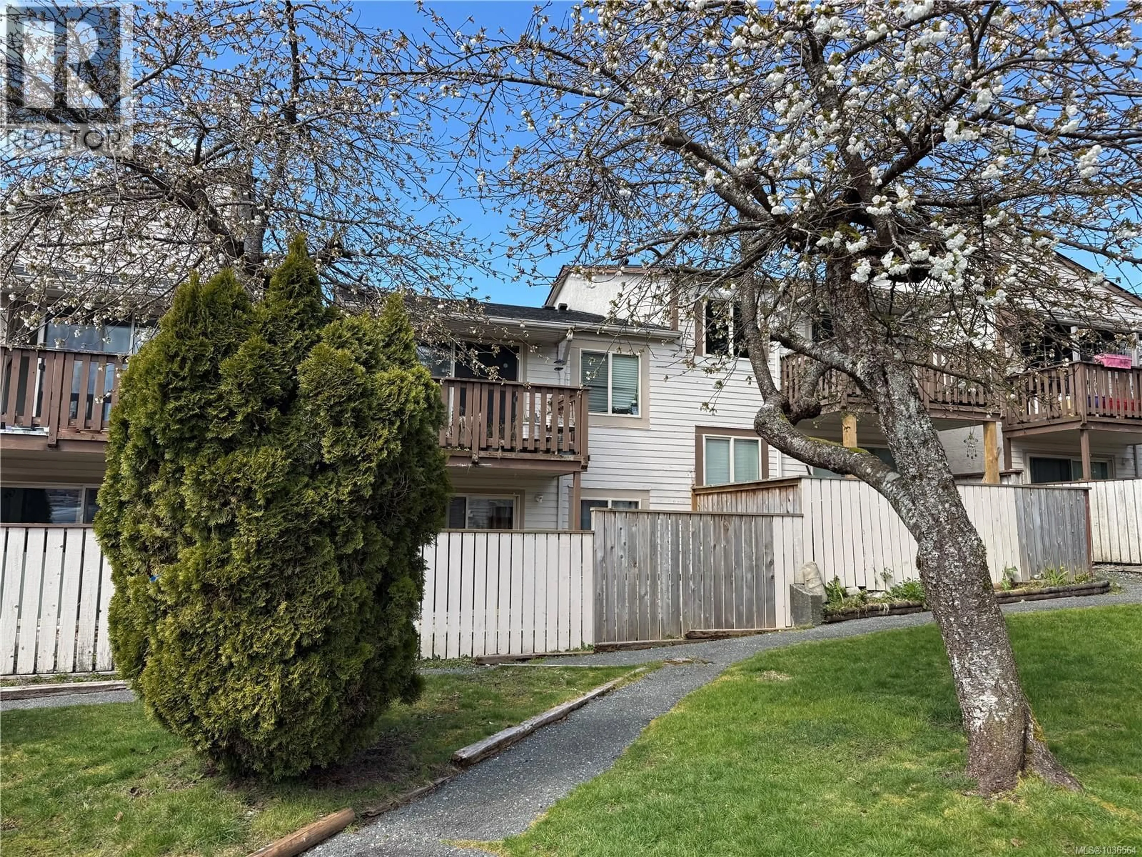 A pic from outside/outdoor area/front of a property/back of a property/a pic from drone, street for 5 - 7077 HIGHLAND DRIVE, Port Hardy British Columbia V0N2P0