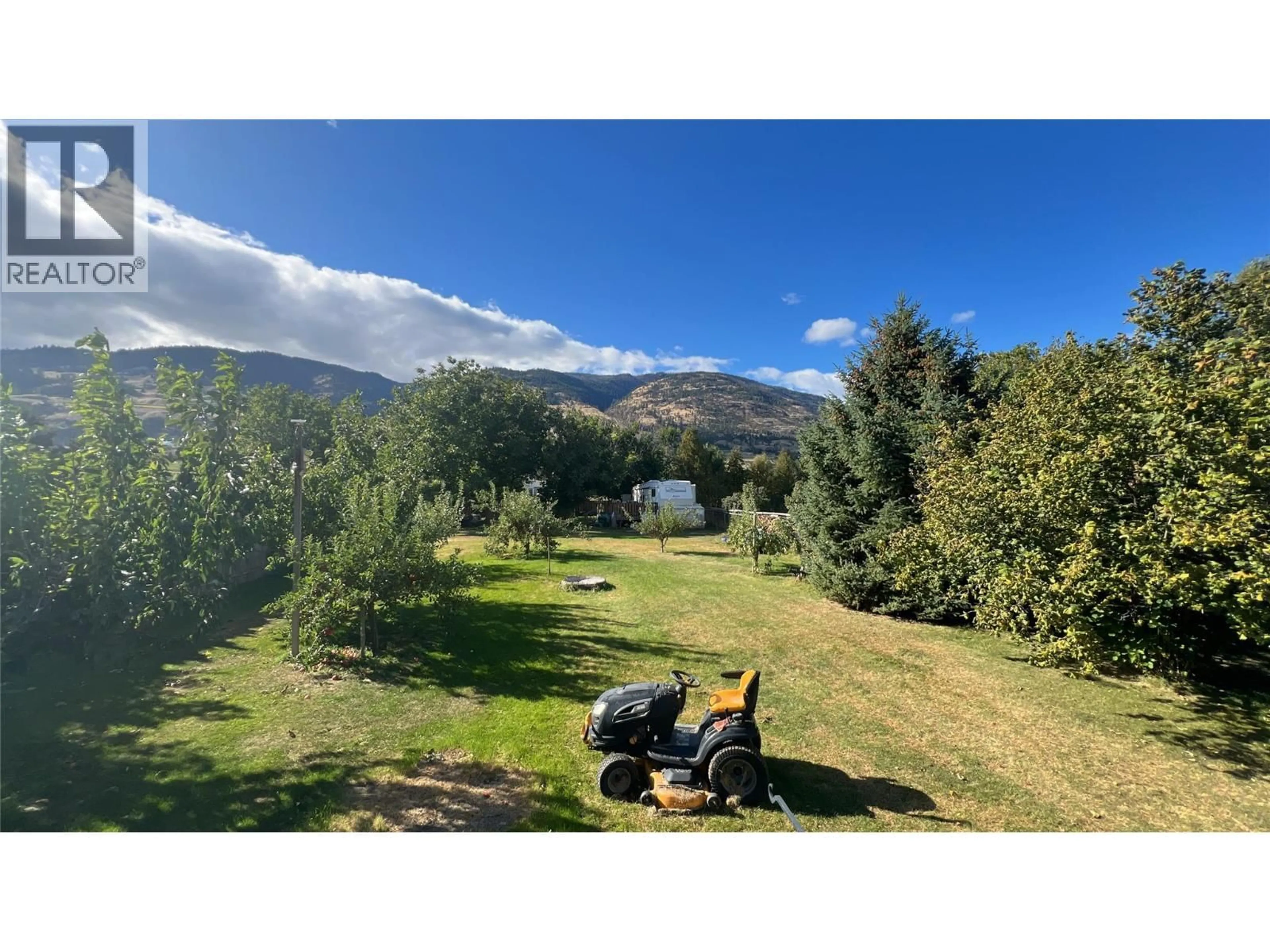 A pic from outside/outdoor area/front of a property/back of a property/a pic from drone, mountain view for 5246 HAYNES ROAD, Oliver British Columbia V0H1T1