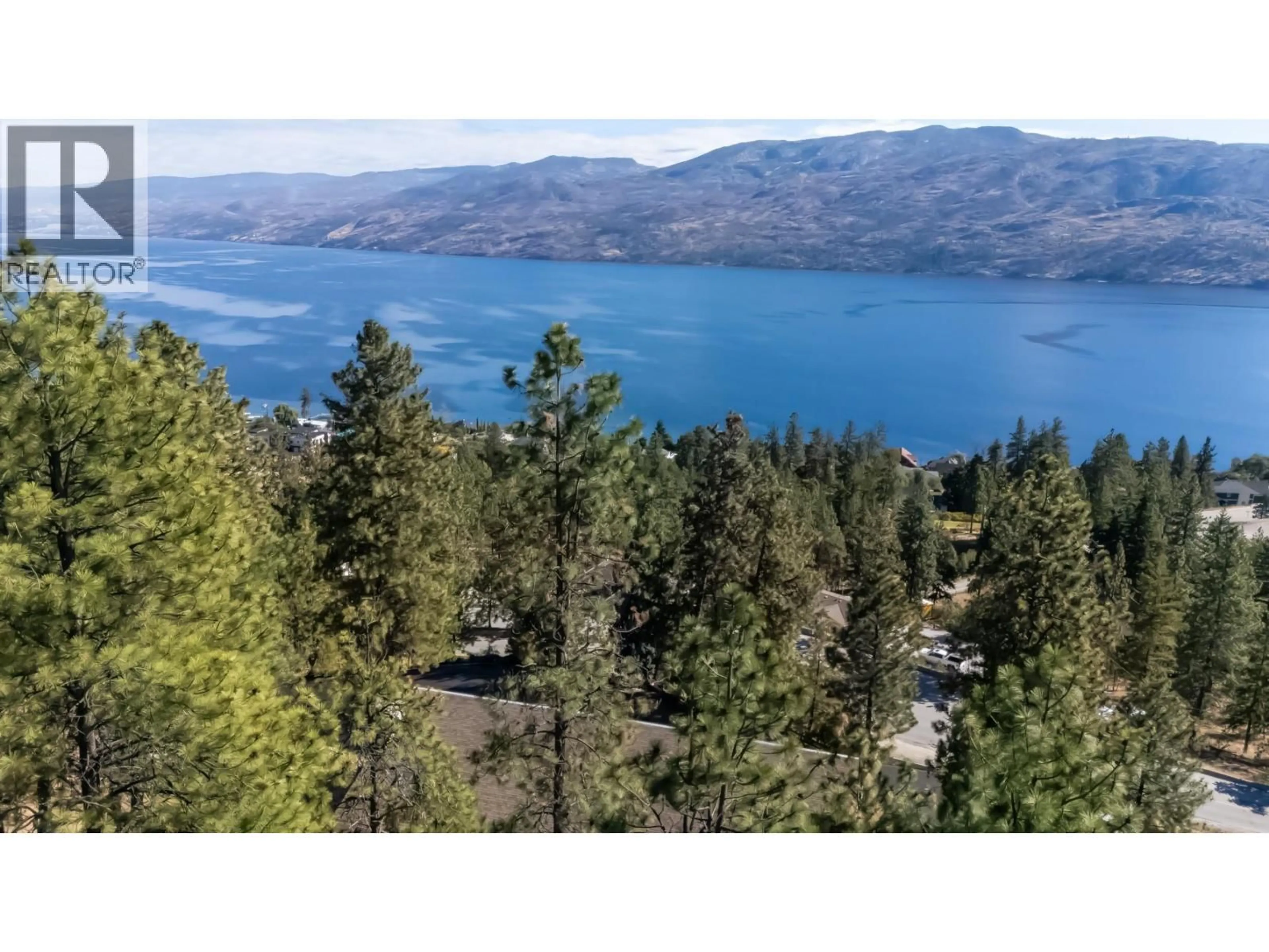 A pic from outside/outdoor area/front of a property/back of a property/a pic from drone, water/lake/river/ocean view for 5290 TREPANIER BENCH ROAD, Peachland British Columbia V0H1X2