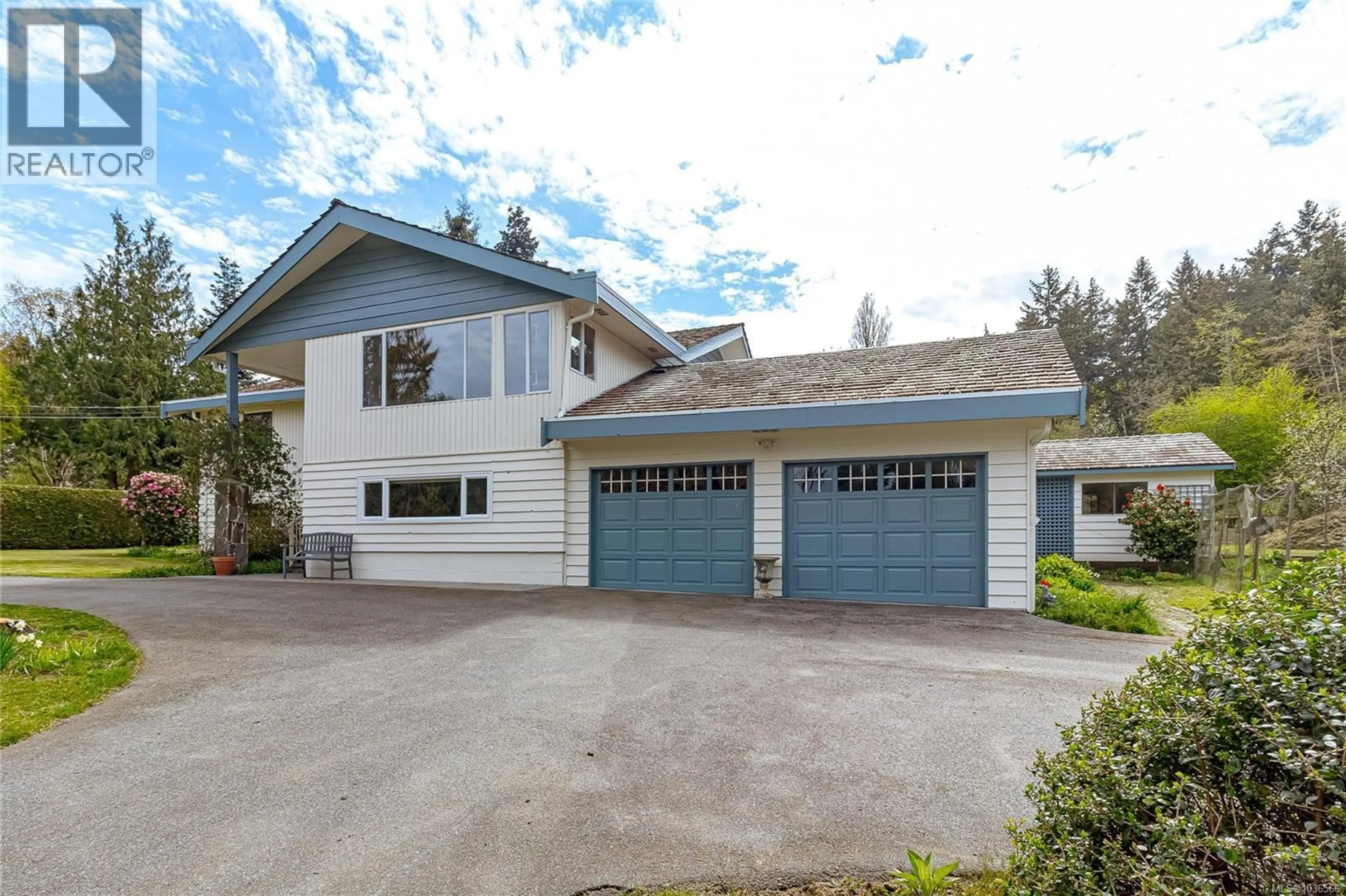 Home with vinyl exterior material, street for 9723 ARDMORE DRIVE, North Saanich British Columbia V8L5H5