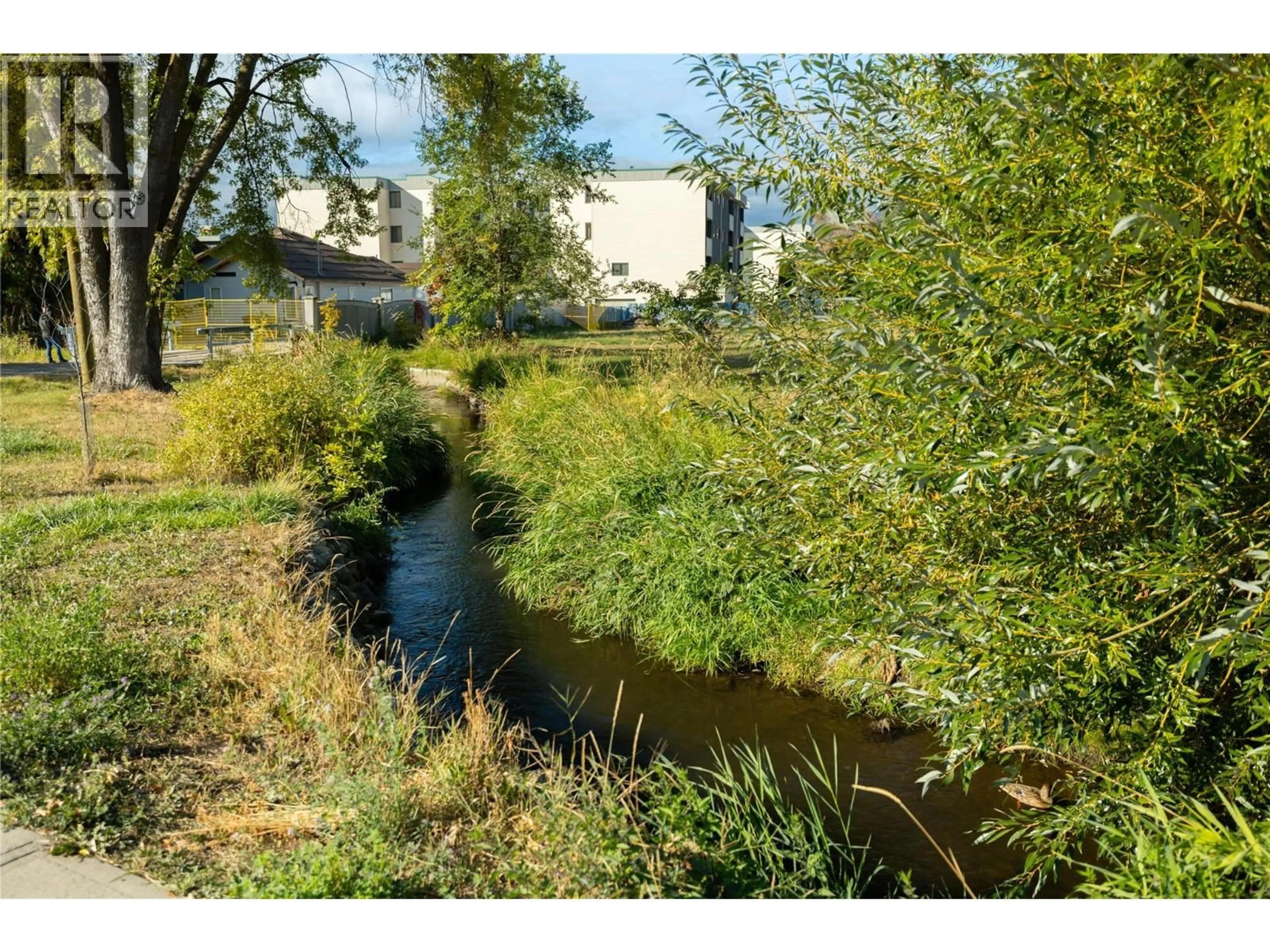 A pic from outside/outdoor area/front of a property/back of a property/a pic from drone, water/lake/river/ocean view for 1923 LINDAHL STREET, Kelowna British Columbia V1Y3Z6