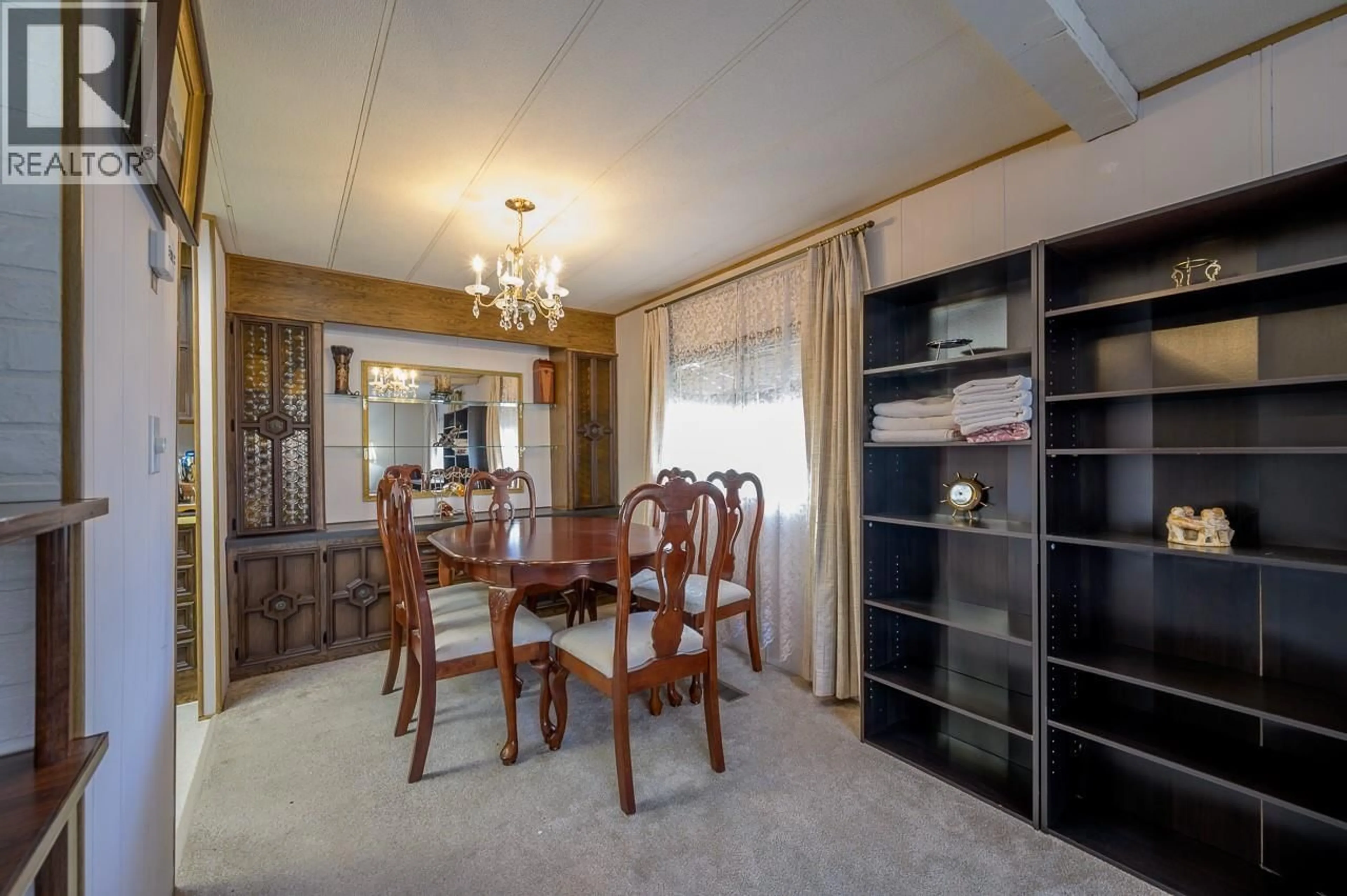 Dining room, wood/laminate floor for 6970 BEDARD ROAD, Kamloops British Columbia V2H0B5