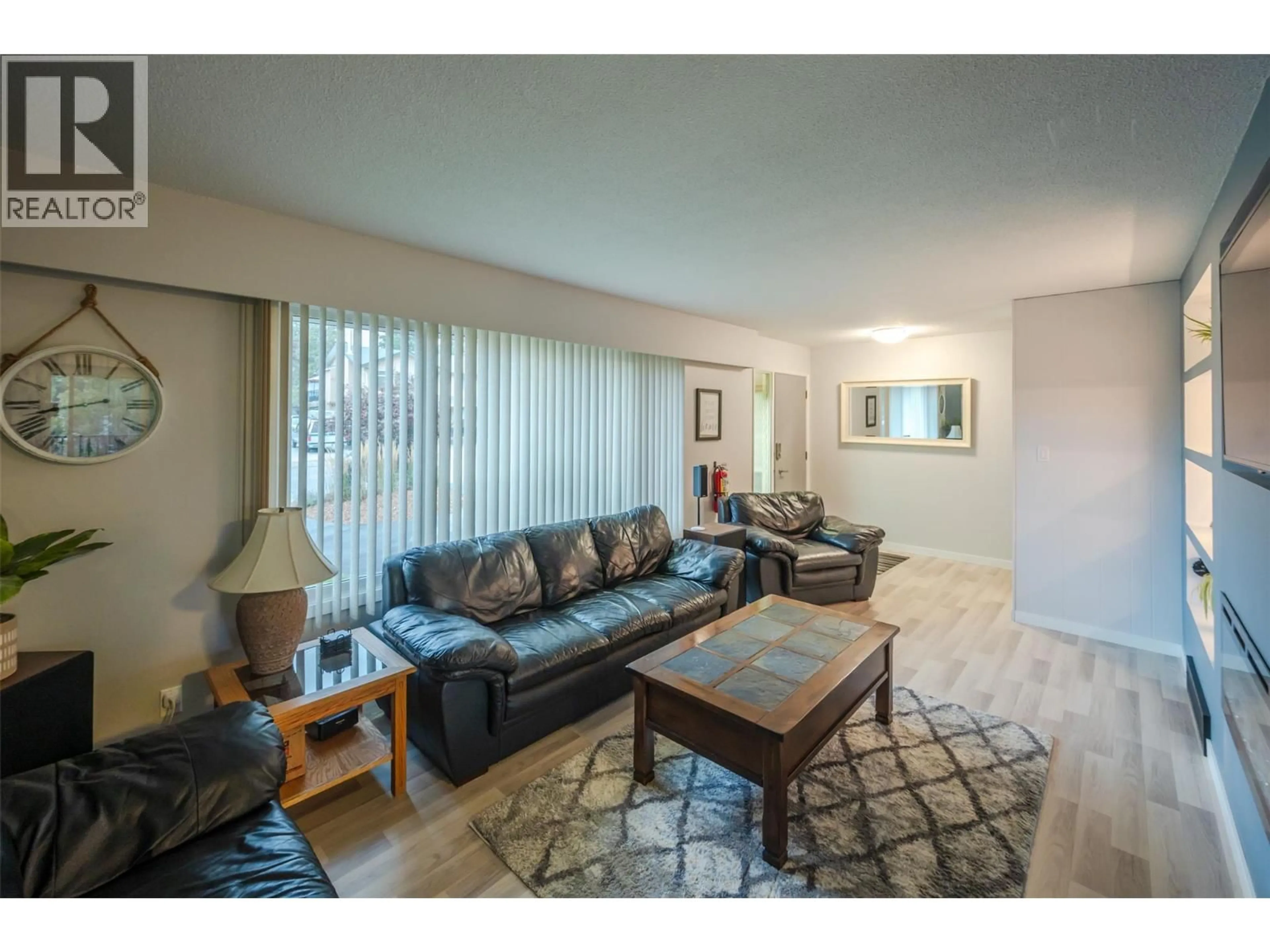 Living room with furniture, unknown for 1306 DUNCAN AVENUE EAST, Penticton British Columbia V2A2X4