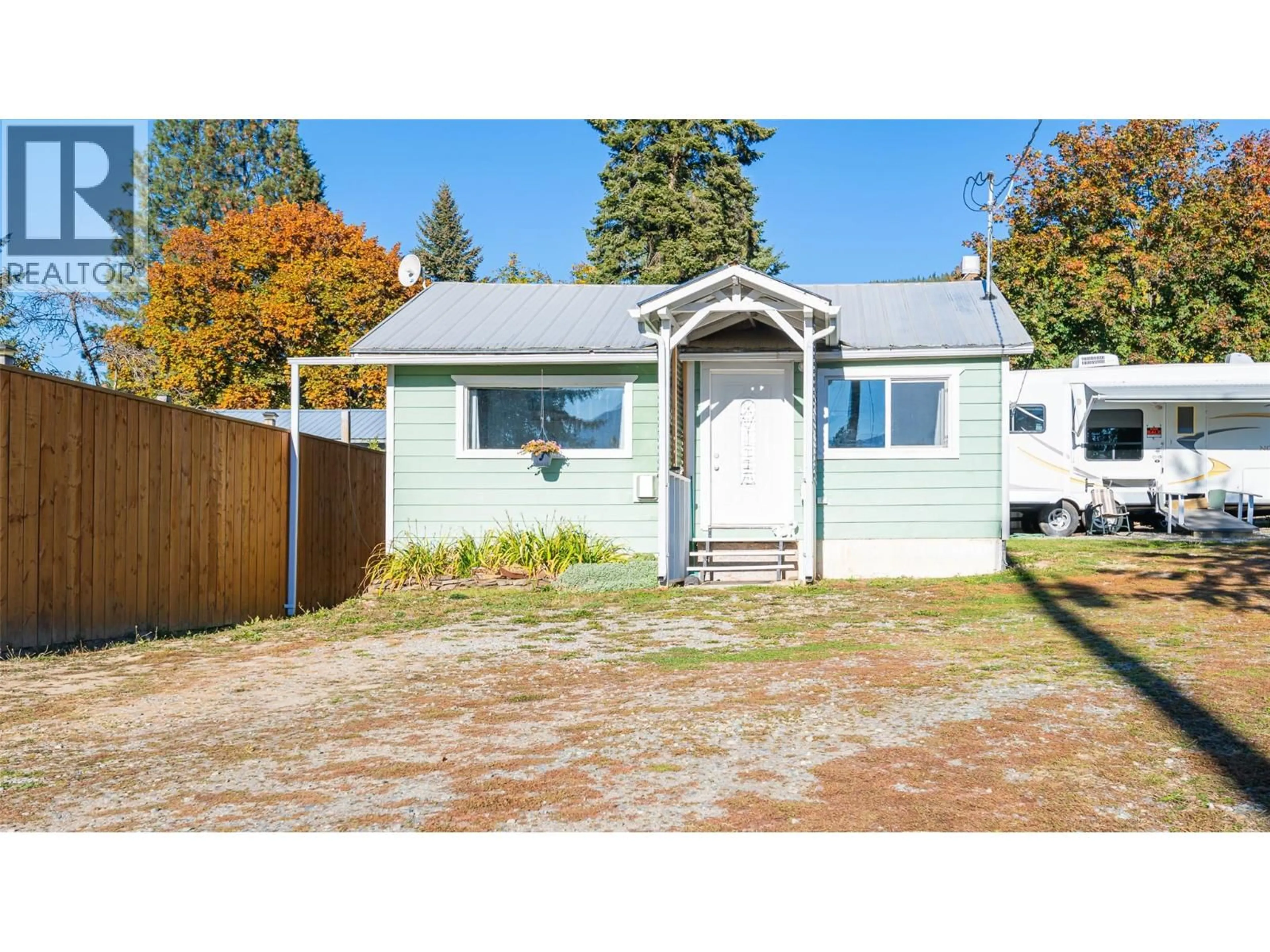 Home with vinyl exterior material, street for 5060 3A HIGHWAY, Wynndel British Columbia V0B2N2