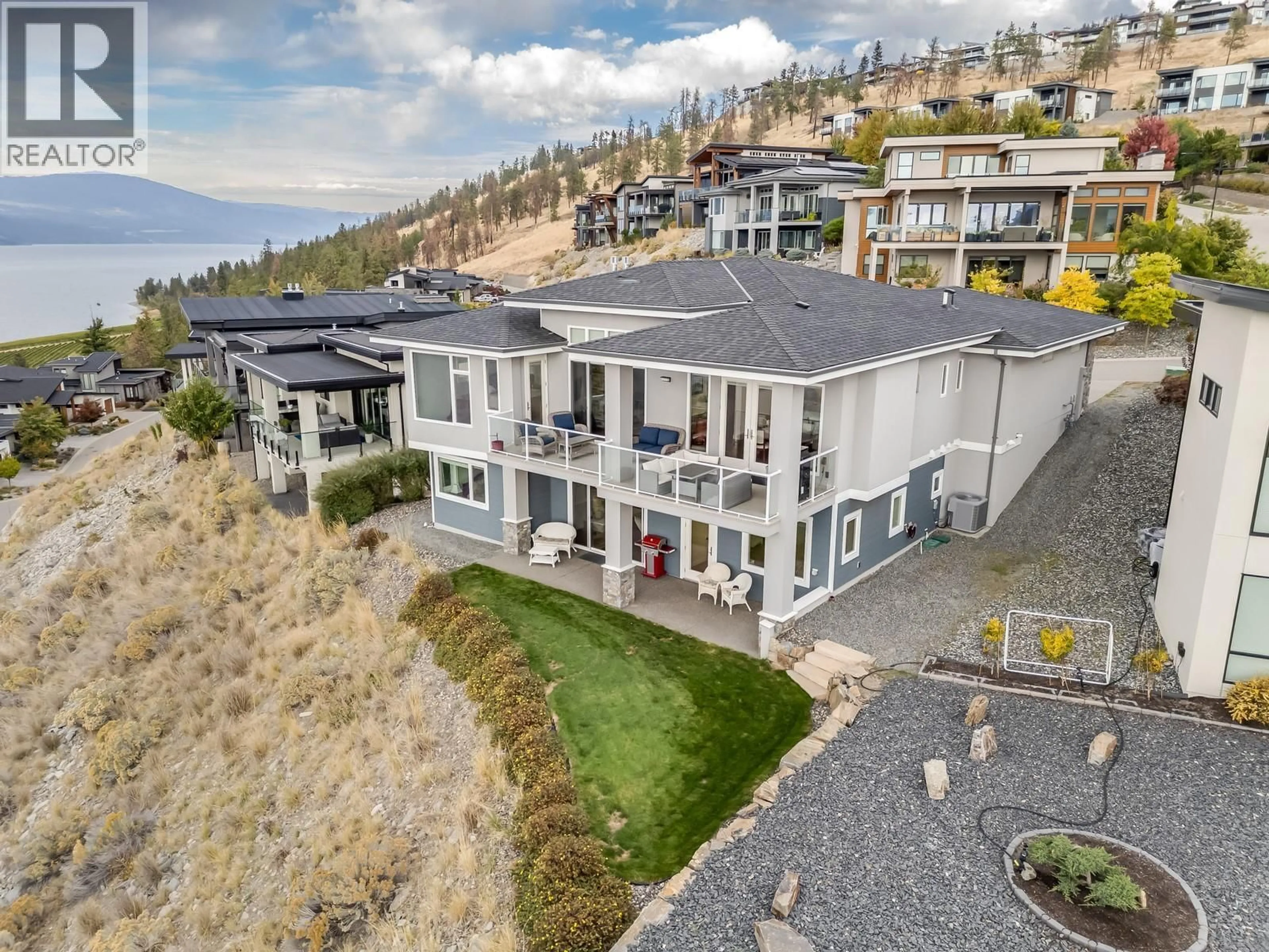 A pic from outside/outdoor area/front of a property/back of a property/a pic from drone, mountain view for 1604 KIMBERLITE DRIVE, Lake Country British Columbia V4V2T4